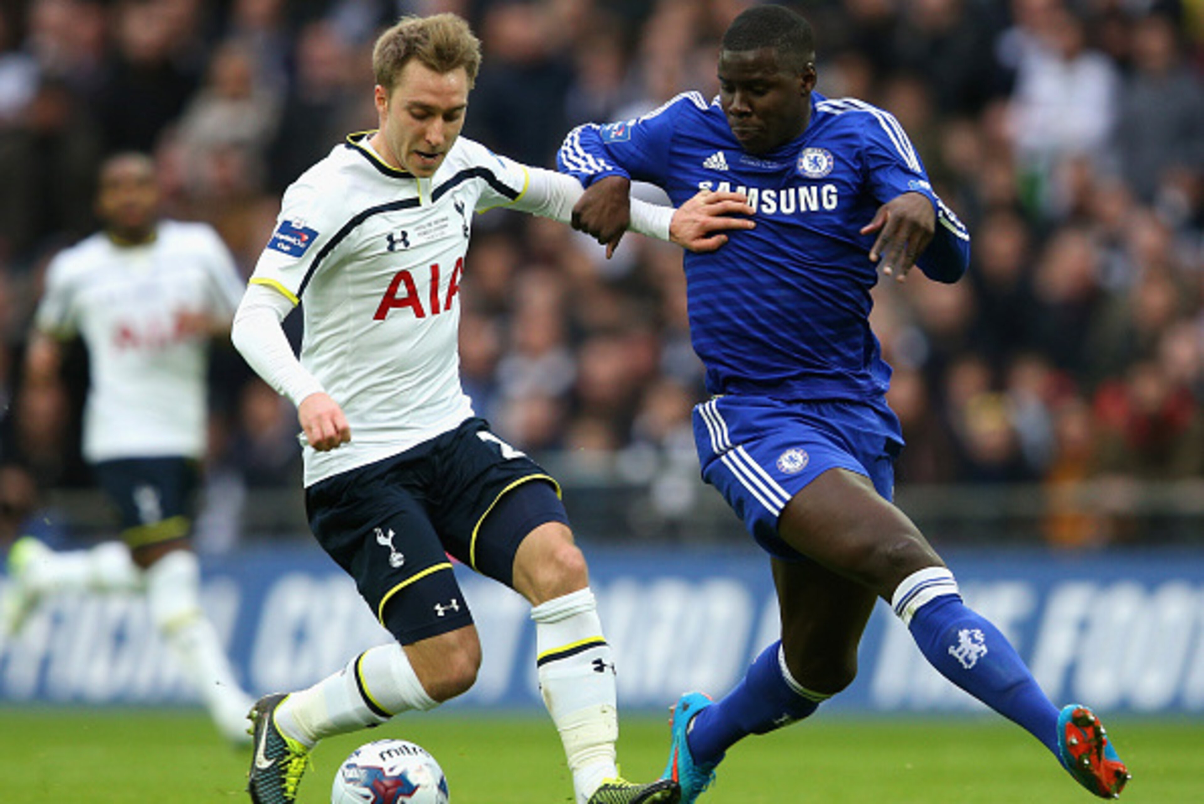LONDON, ENGLAND - MARCH 01: Christian Eriksen of Spurs and Kurt Zouma of Chelsea battle for the ball during the Capital One Cup Final match between Chelsea and Tottenham Hotspur at Wembley Stadium on March 1, 2015 in London, England. (Photo by Clive Mas LONDON, ENGLAND - MARCH 01: Christian Eriksen of Spurs and Kurt Zouma of Chelsea battle for the ball during the Capital One Cup Final match between Chelsea and Tottenham Hotspur at Wembley Stadium on March 1, 2015 in London, England. (Photo by Clive Mas