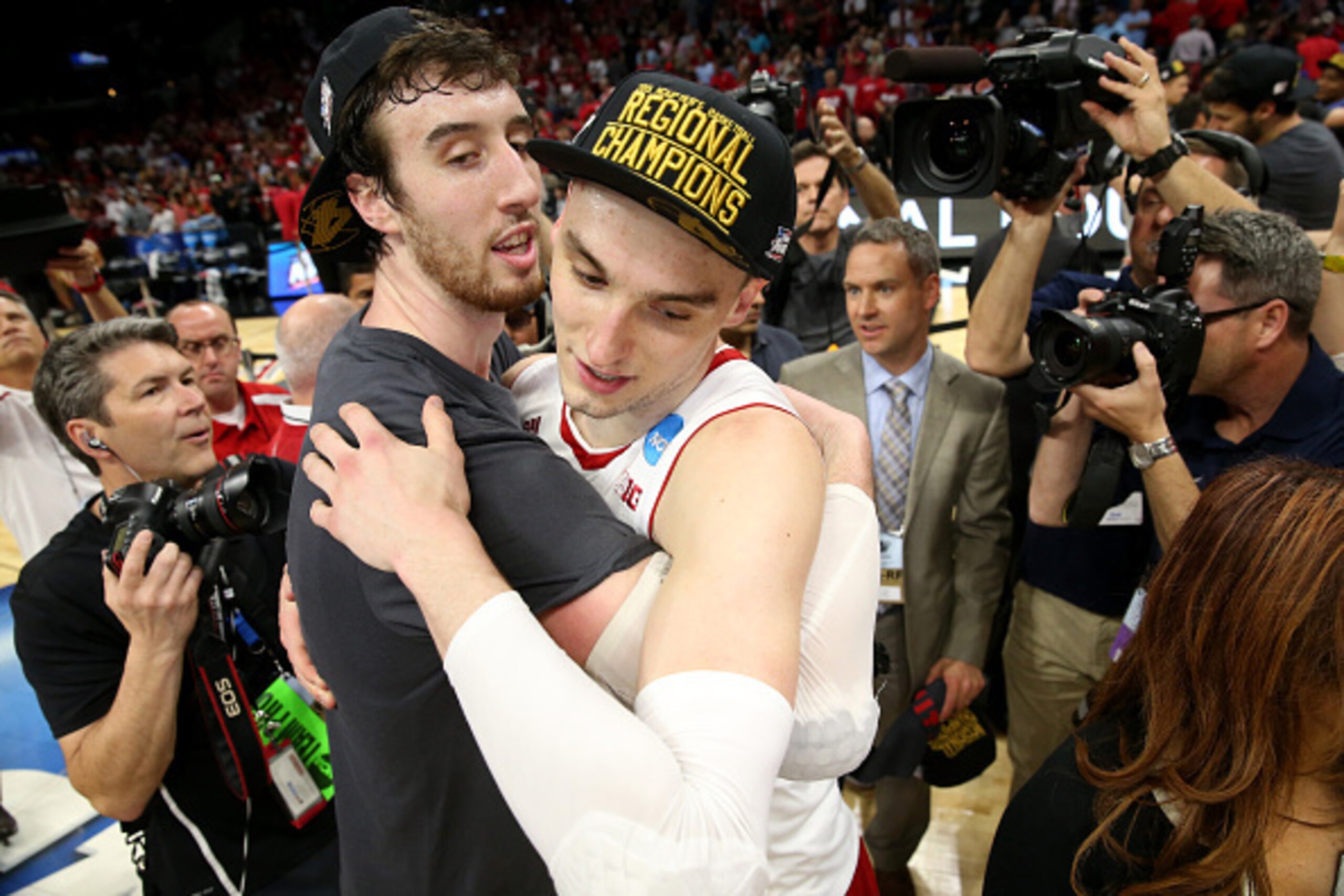 LOS ANGELES, CA - MARCH 28:  Frank Kaminsky #44 and Sam Dekker #15 of the Wisconsin Badgers celebrate the Badgers 85-78 win against the Arizona Wildcats during the West Regional Final of the 2015 NCAA Men's Basketball Tournament at Staples Center on March