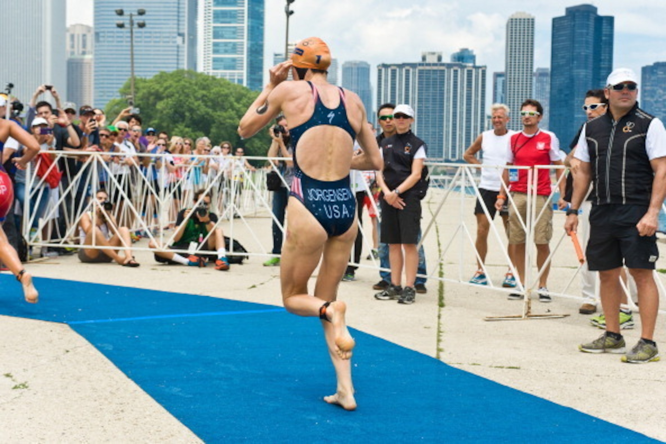 CHICAGO, IL - JUNE 28:  Gwen Jorgensen of the United States competes and won first place in the Elite Women's race in the 2014 ITU World Triathlon in Grant Park on June 28, 2014 in Chicago, Illinois.  (Photo by Timothy Hiatt/Getty Images)