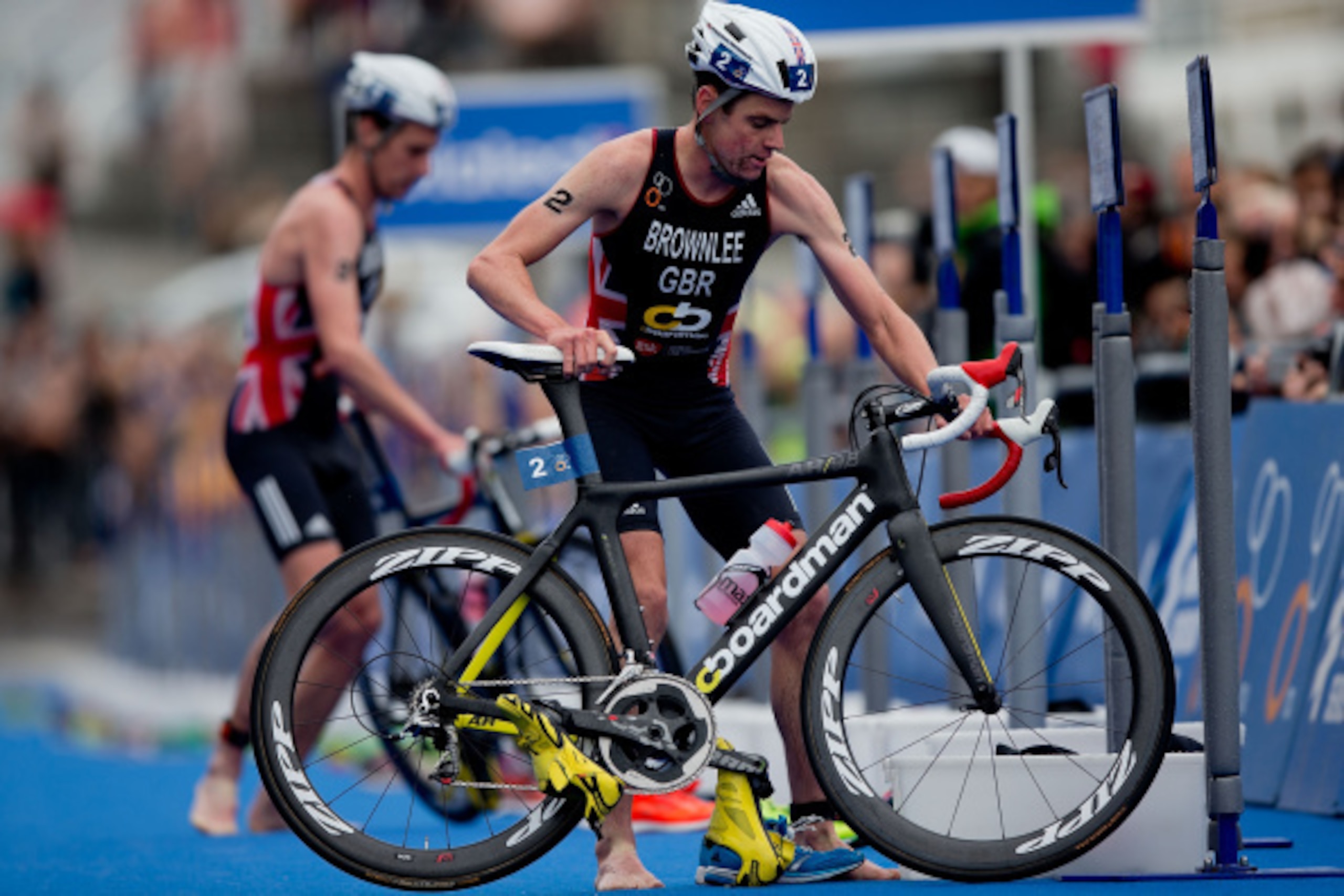 STOCKHOLM, SWEDEN - AUGUST 23: Elite Men Sprint Race winner Jonathan Brownlee from Great Britain takes his bike prior to start the biking course ahead his teammate Alistair Brownlee during the ITU World Triathlon on August 23, 2014 in Stockholm, Sweden. (