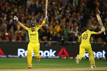 MELBOURNE, AUSTRALIA - MARCH 29:  Shane Watson and Steve Smith of Australia celebrates victory during the 2015 ICC Cricket World Cup final match between Australia and New Zealand at Melbourne Cricket Ground on March 29, 2015 in Melbourne, Australia.  (Pho