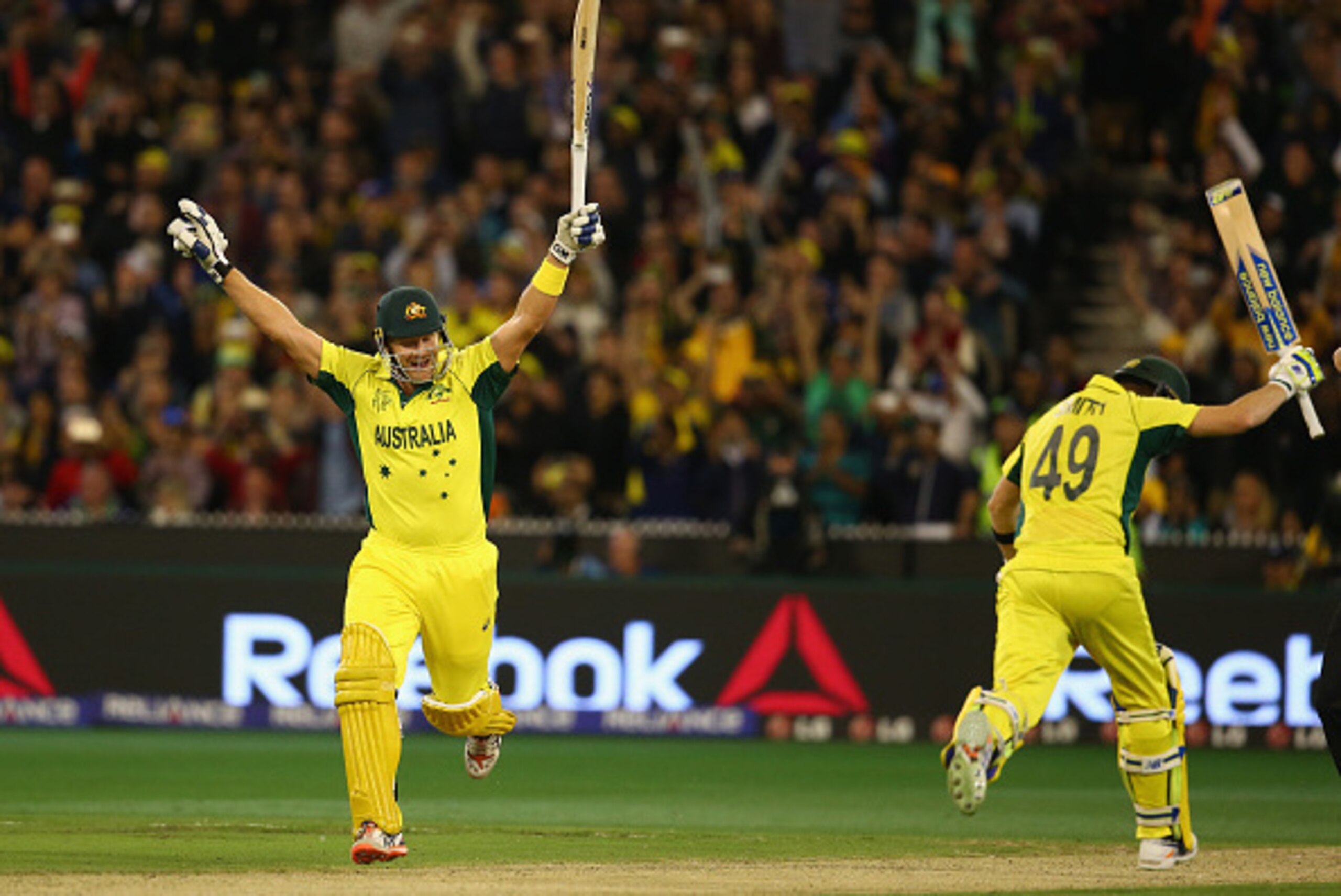 MELBOURNE, AUSTRALIA - MARCH 29:  Shane Watson and Steve Smith of Australia celebrates victory during the 2015 ICC Cricket World Cup final match between Australia and New Zealand at Melbourne Cricket Ground on March 29, 2015 in Melbourne, Australia.  (Pho