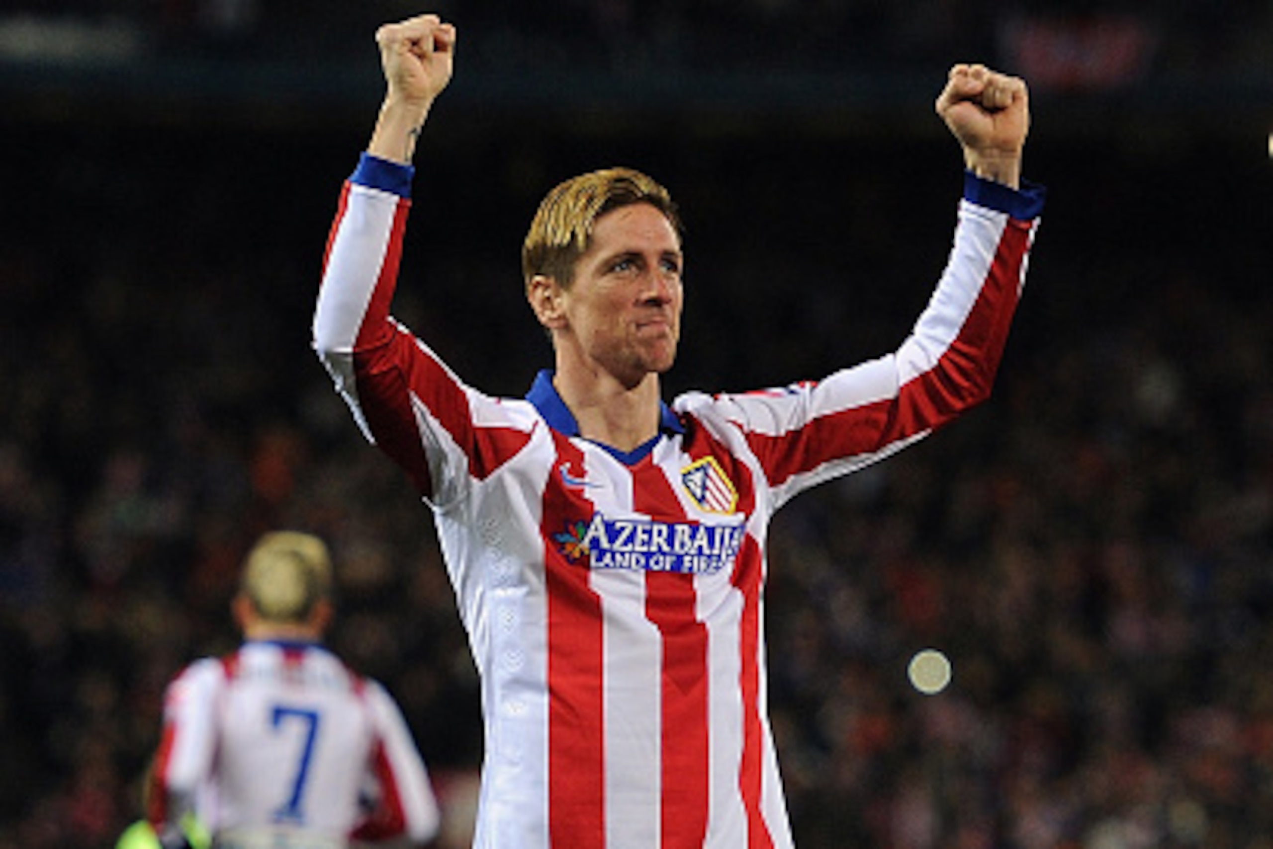 MADRID, SPAIN - JANUARY 28:  Fernando Torres of Club Atletico de Madrid celebrates after scoring his team's opening goal during the Copa del Rey Quarter Final Second Leg match between Club Atletico de Madrid and FC Barcelona at Vicente Calderon Stadium on