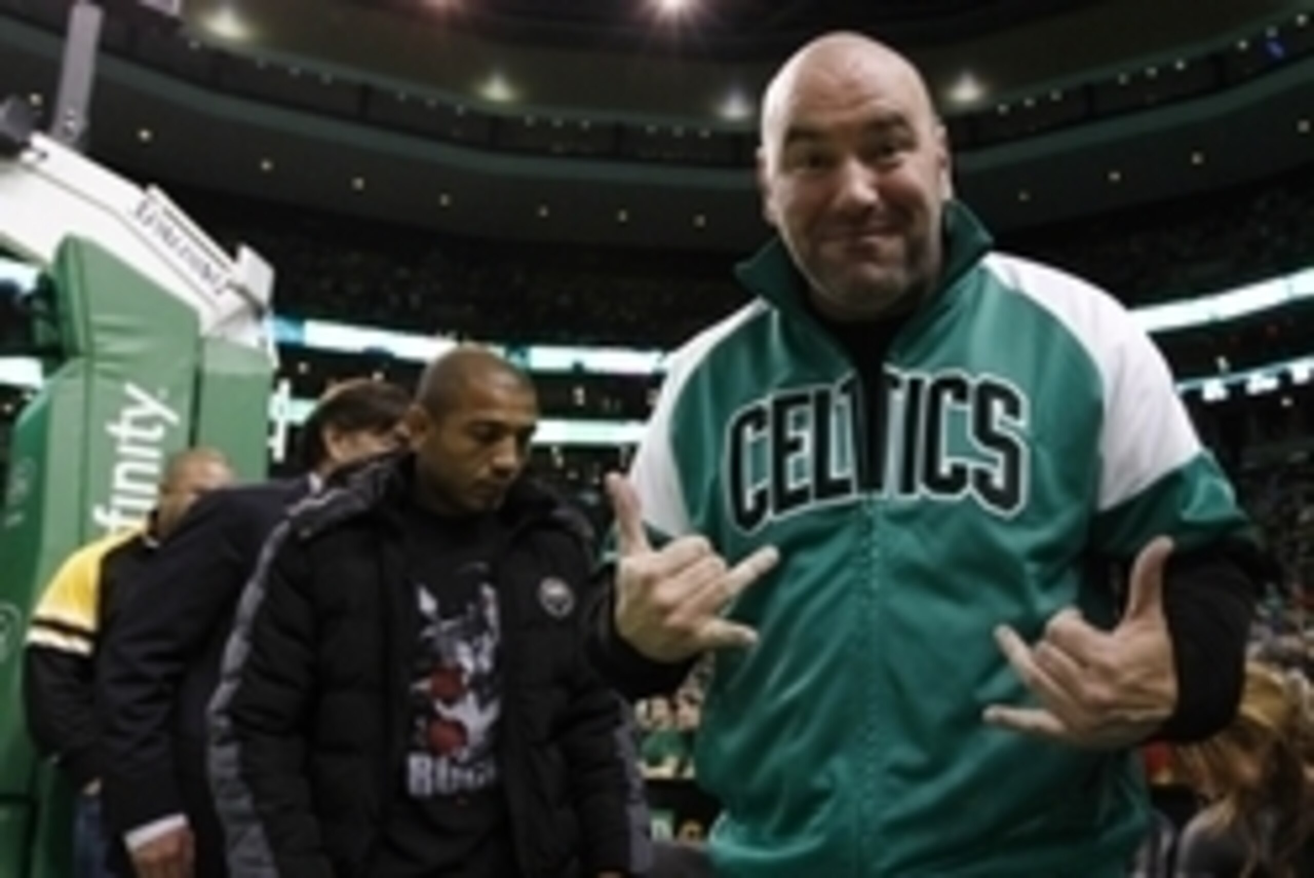 Jan 16, 2015; Boston, MA, USA; UFC president Dana White (right) and UFC featherweight champion Jose Aldo watch a game between the Boston Celtics and the Chicago Bulls during the first half at TD Garden. Mandatory Credit: Mark L. Baer-USA TODAY Sports