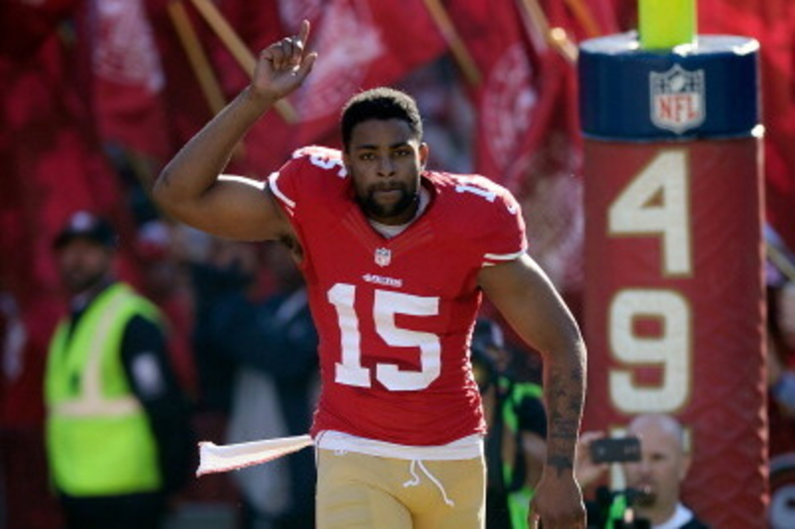 SAN FRANCISCO, CA - DECEMBER 01:  Michael Crabtree #15 of the San Francisco 49ers runs onto the field during player introductions prior to playing the St. Louis Rams at Candlestick Park on December 1, 2013 in San Francisco, California.  (Photo by Thearon 