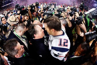 GLENDALE, AZ - FEBRUARY 01:  Tom Brady #12 of the New England Patriots celebrates with head coach Bill Belichick after defeating the Seattle Seahawks 28-24 during Super Bowl XLIX at University of Phoenix Stadium on February 1, 2015 in Glendale, Arizona.  