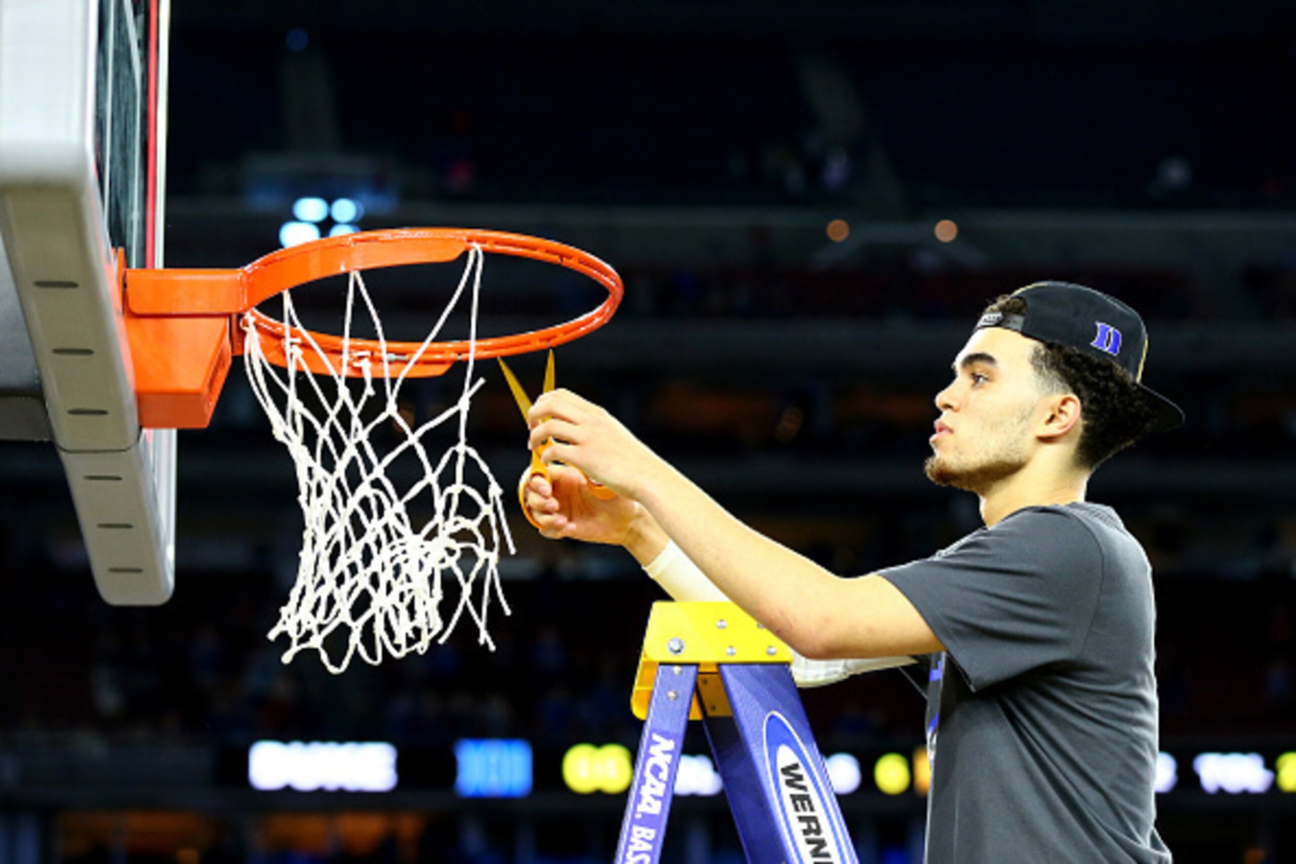 HOUSTON, TX - MARCH 29:  Tyus Jones #5 of the Duke Blue Devils cuts the net after defeating the Gonzaga Bulldogs 66-52 in the South Regional Final of the 2015 NCAA Men's Basketball Tournament at NRG Stadium on March 29, 2015 in Houston, Texas.  (Photo by 