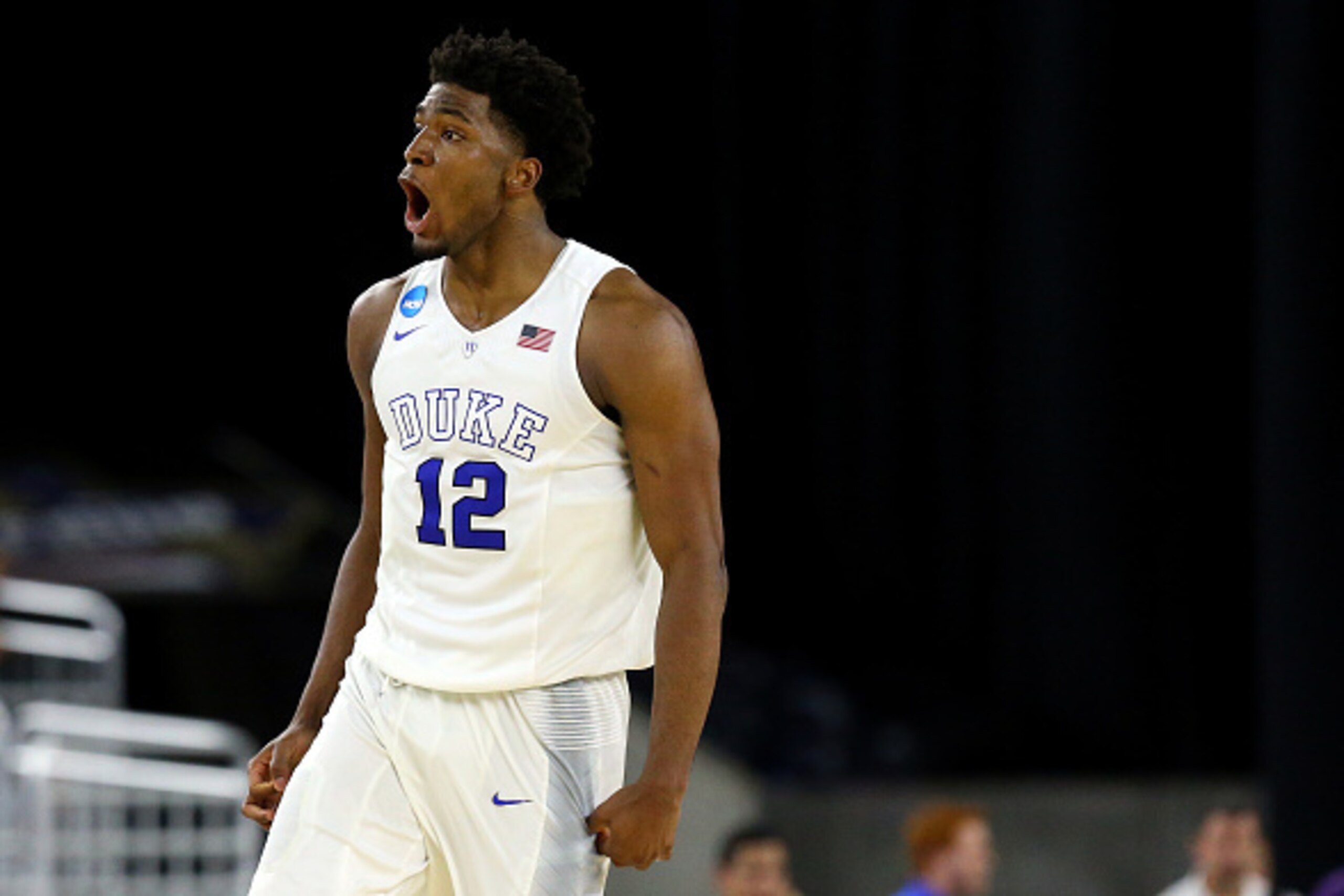 HOUSTON, TX - MARCH 29: Justise Winslow #12 of the Duke Blue Devils reacts against the Gonzaga Bulldogs during the South Regional Final of the 2015 NCAA Men's Basketball Tournament at NRG Stadium on March 29, 2015 in Houston, Texas.  (Photo by Ronald Mart