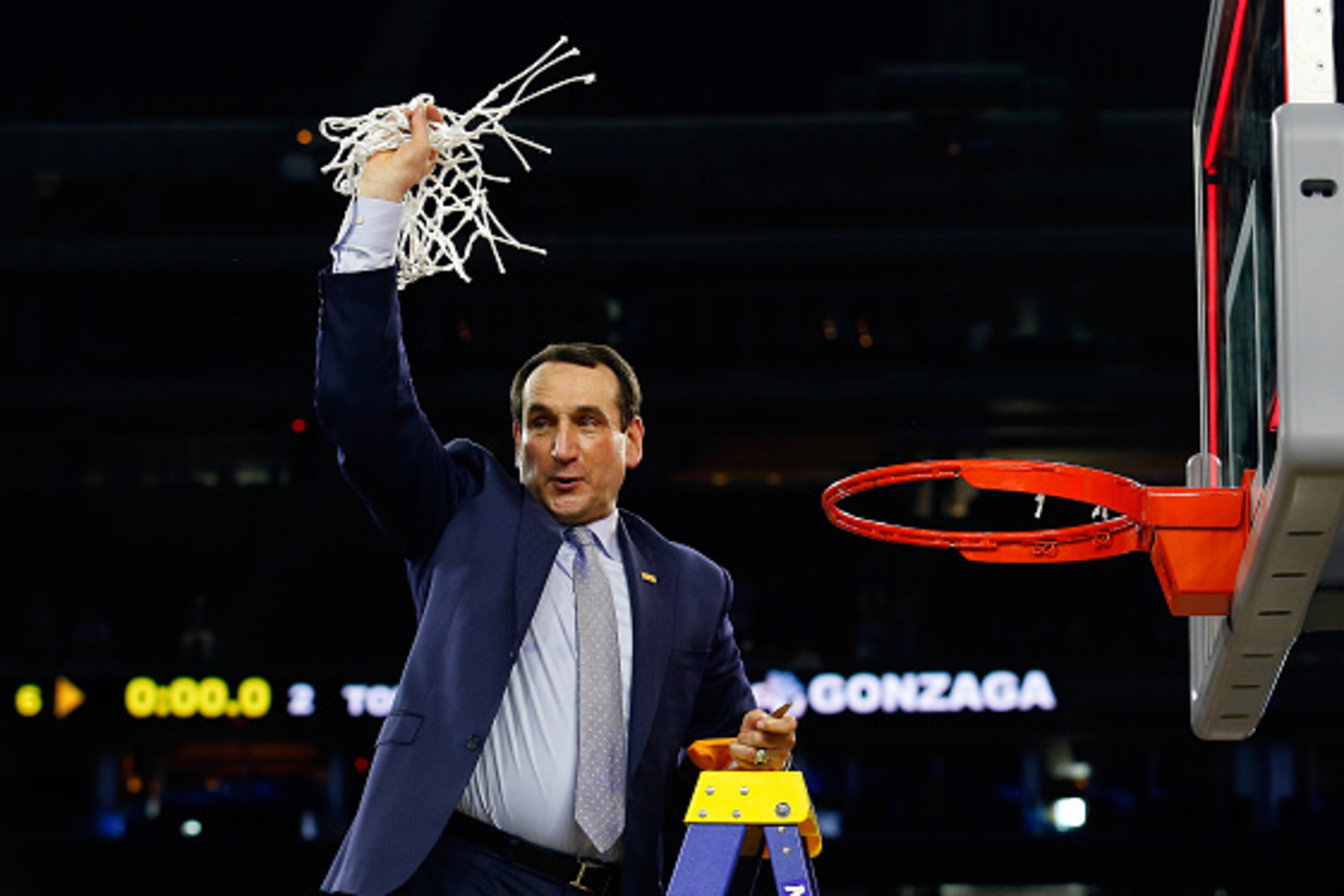 HOUSTON, TX - MARCH 29:  Head coach Mike Krzyzewski of the Duke Blue Devils cuts down the net after defeating the Gonzaga Bulldogs 66-52 in the South Regional Final of the 2015 NCAA Men's Basketball Tournament at NRG Stadium on March 29, 2015 in Houston, 