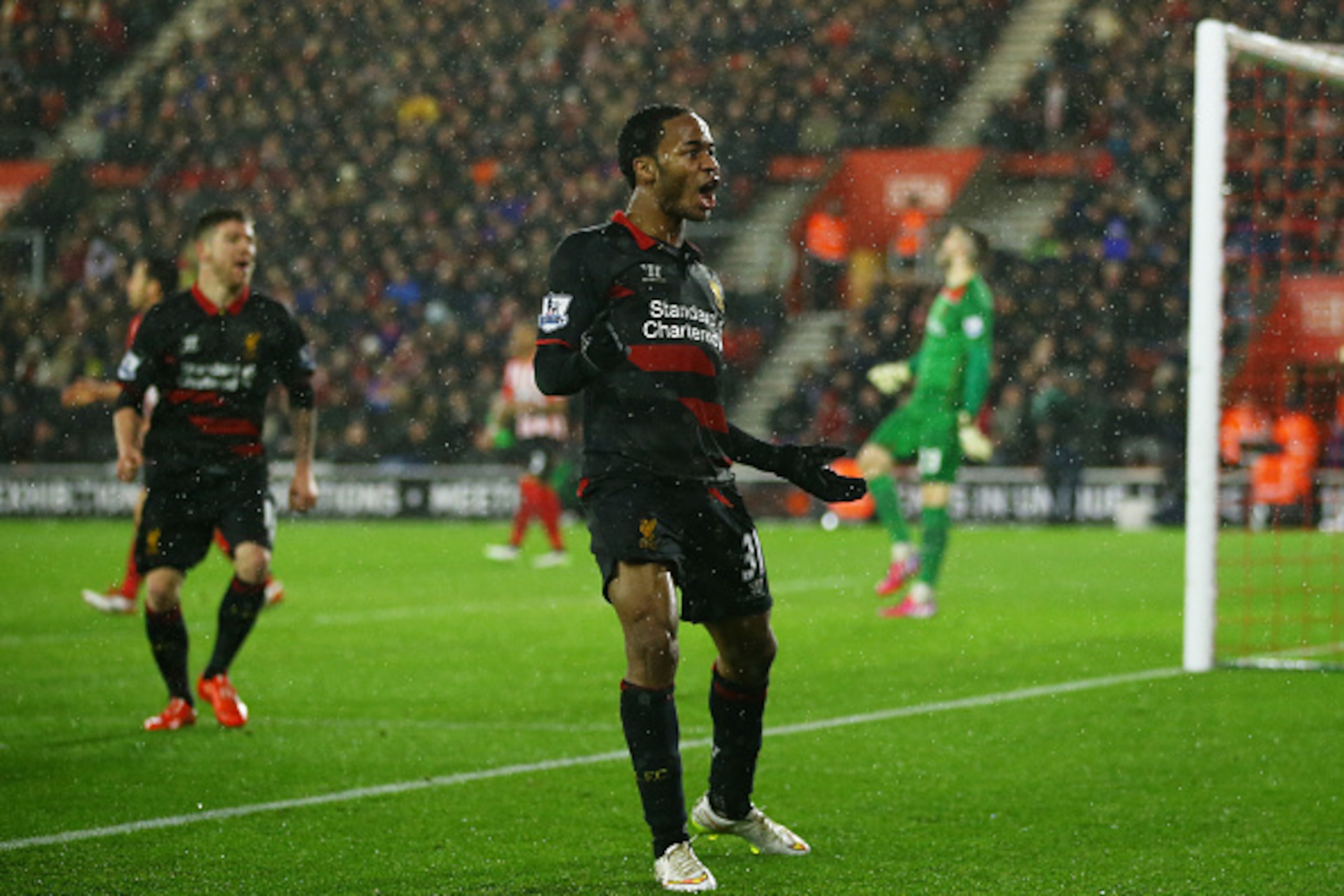 SOUTHAMPTON, ENGLAND - FEBRUARY 22:  Raheem Sterling of Liverpool celebrates after scoring his team's second goal during the Barclays Premier League match between Southampton and Liverpool at St Mary's Stadium on February 22, 2015 in Southampton, England.