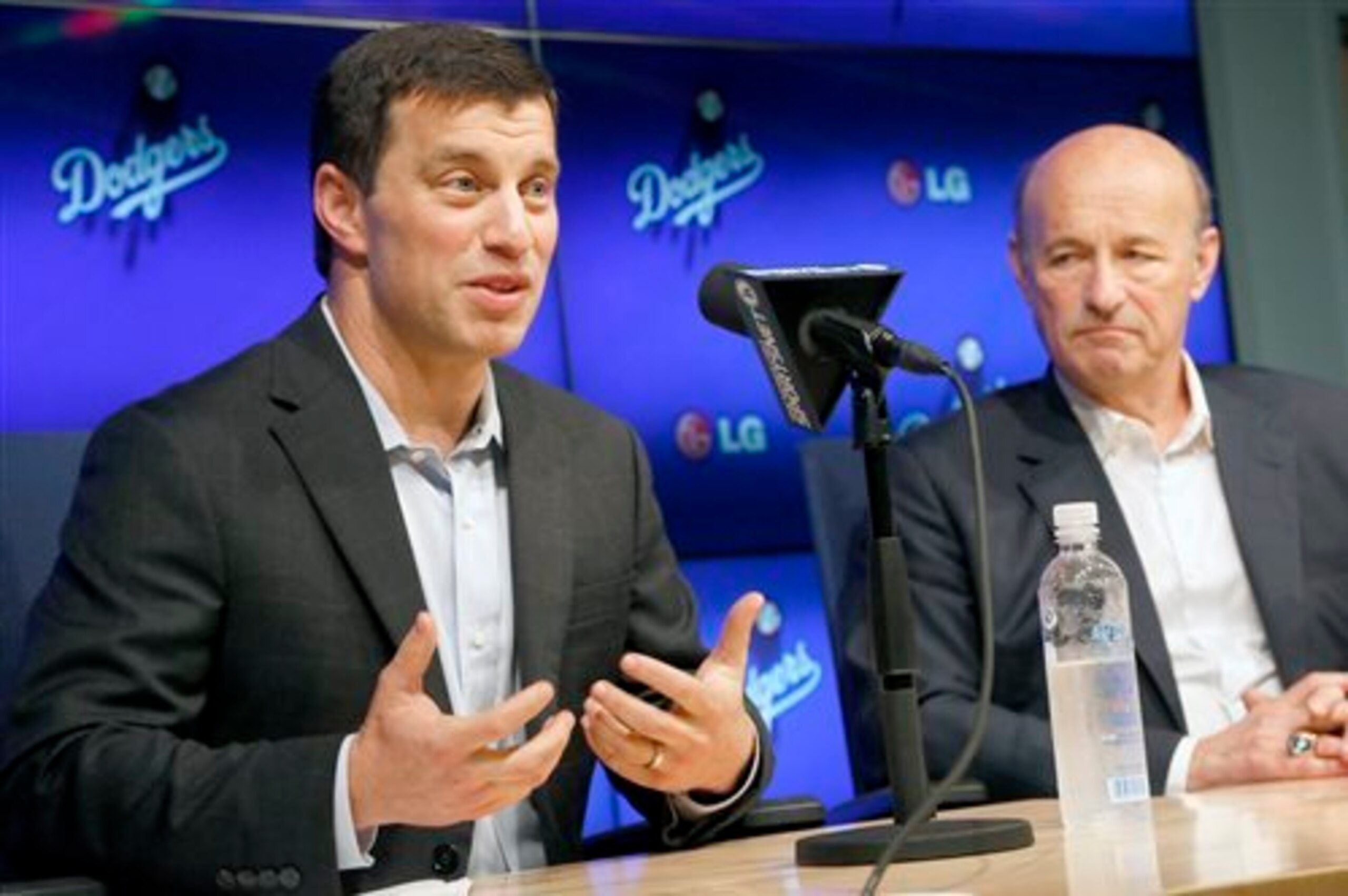 Andrew Friedman (left) and team president Stan Kasten