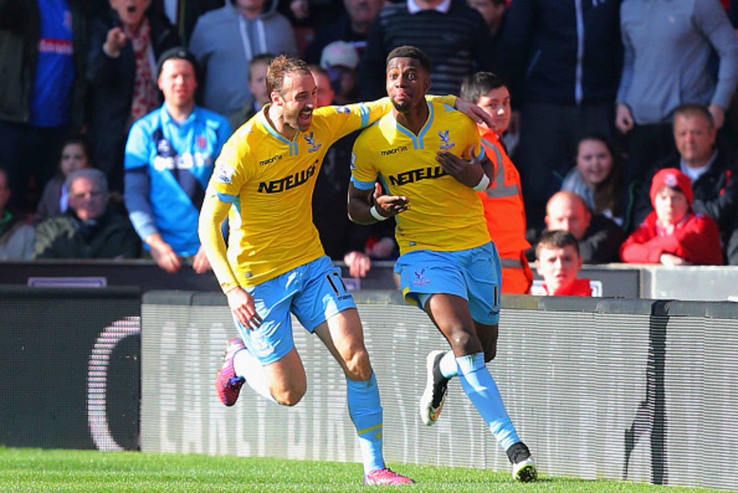 STOKE ON TRENT, ENGLAND - MARCH 21:  Wilfried Zaha of Crystal Palace (R) celebrates scoring their second goal with Glenn Murray of Crystal Palace during the Barclays Premier League match between Stoke City and Crystal Palace at Britannia Stadium on March 