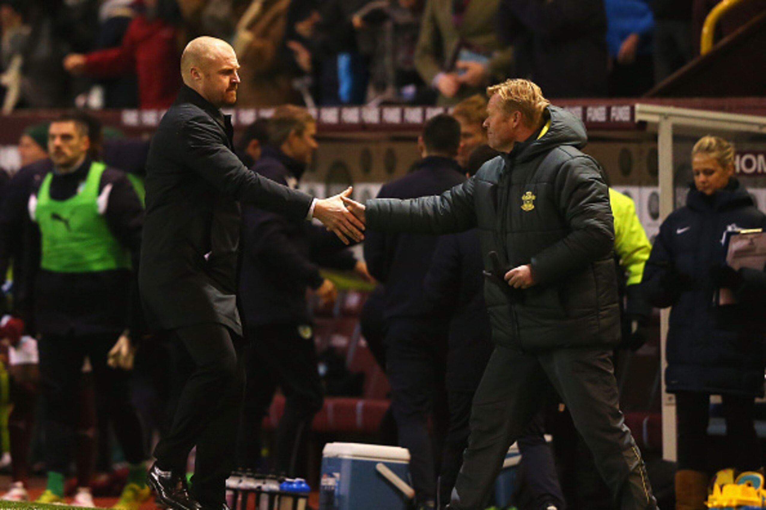 BURNLEY, ENGLAND - DECEMBER 13: Sean Dyche, manager of Burnley shakes hands with Ronald Koeman, manager of Southampton after the Barclays Premier League match between Burnley and Southampton at Turf Moor on December 13, 2014 in Burnley, England.  (Photo b