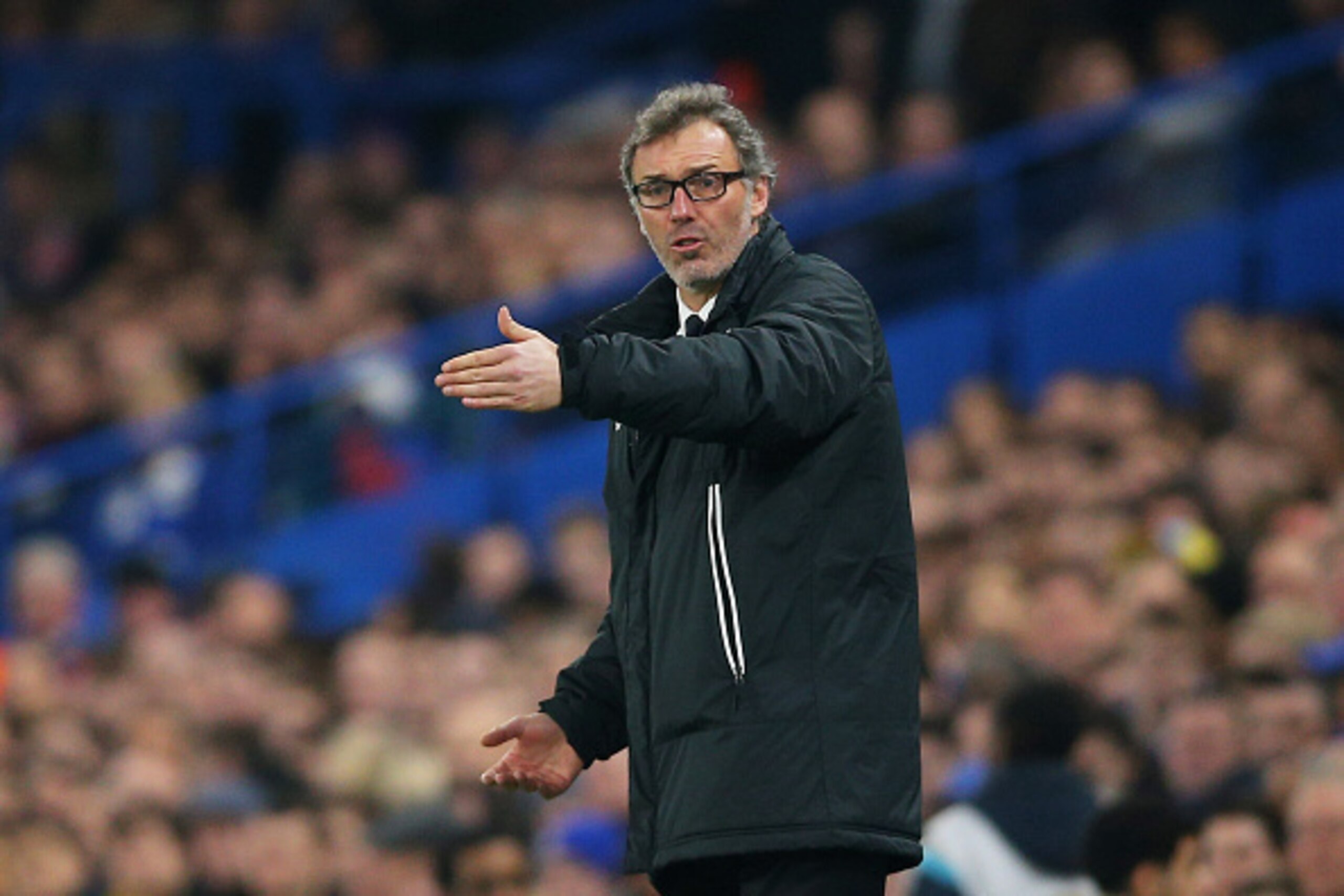 LONDON, ENGLAND - MARCH 11:  Laurent Blanc the head coach of PSG directs his players during the UEFA Champions League Round of 16, second leg match between Chelsea and Paris Saint-Germain at Stamford Bridge on March 11, 2015 in London, England.  (Photo by