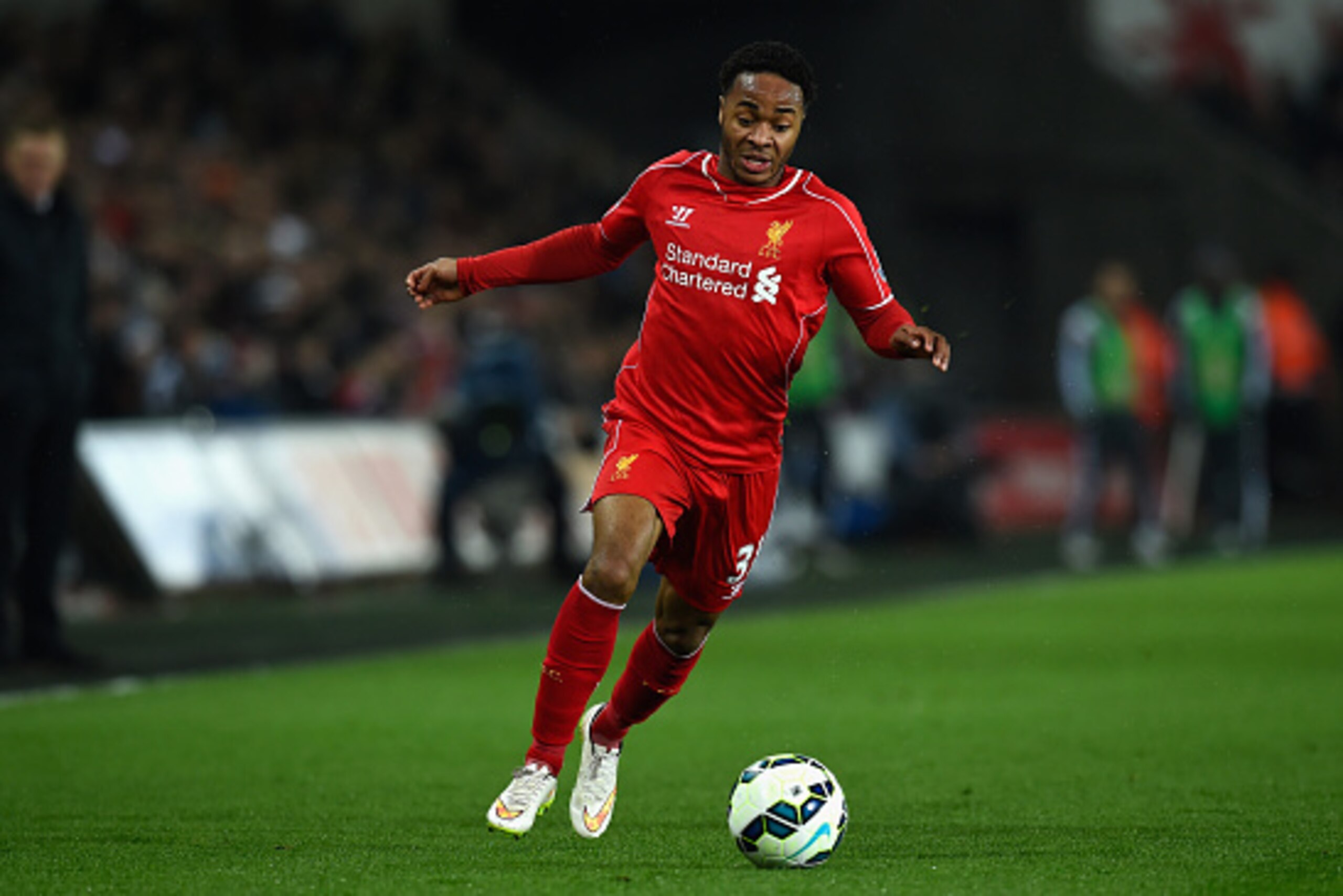 SWANSEA, WALES - MARCH 16:  Liverpool player Raheem Sterling in action during the Barclays Premiership match between Swansea City and Liverpool at Liberty Stadium on March 16, 2015 in Swansea, Wales.  (Photo by Stu Forster/Getty Images)