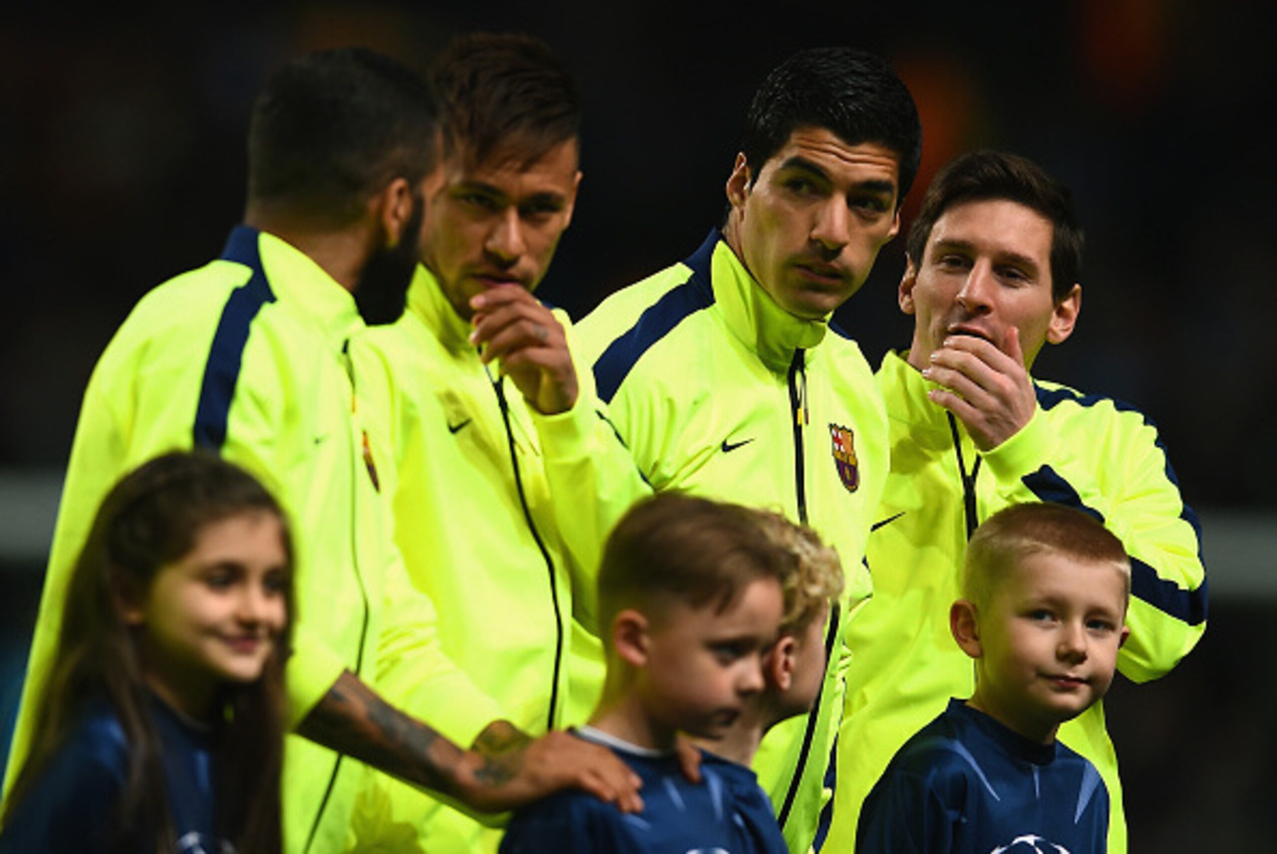MANCHESTER, ENGLAND - FEBRUARY 24: (L-R) Lionel Messi, Luis Suarez and Neymar of Barcelona  line up during the UEFA Champions League Round of 16 match between Manchester City and Barcelona at Etihad Stadium on February 24, 2015 in Manchester, United Kingd
