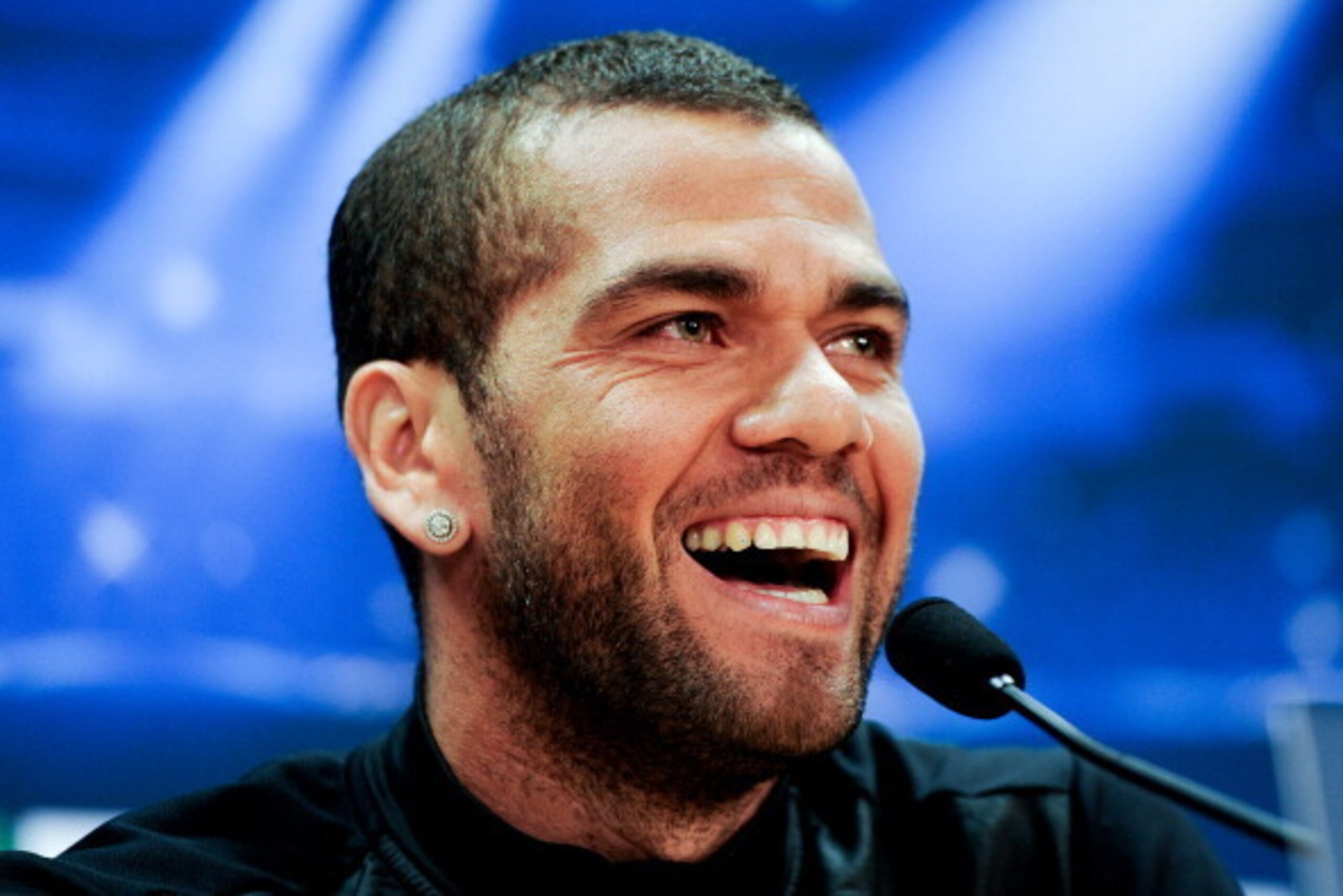 BARCELONA, SPAIN - MARCH 31:  Dani Alves of FC Barcelona faces the media during a press conference ahead the UEFA Champions League Quarter Final first leg match against Atletico de Madrid at Sant Joan Despi Sport Complex on March 31, 2014 in Barcelona, Sp
