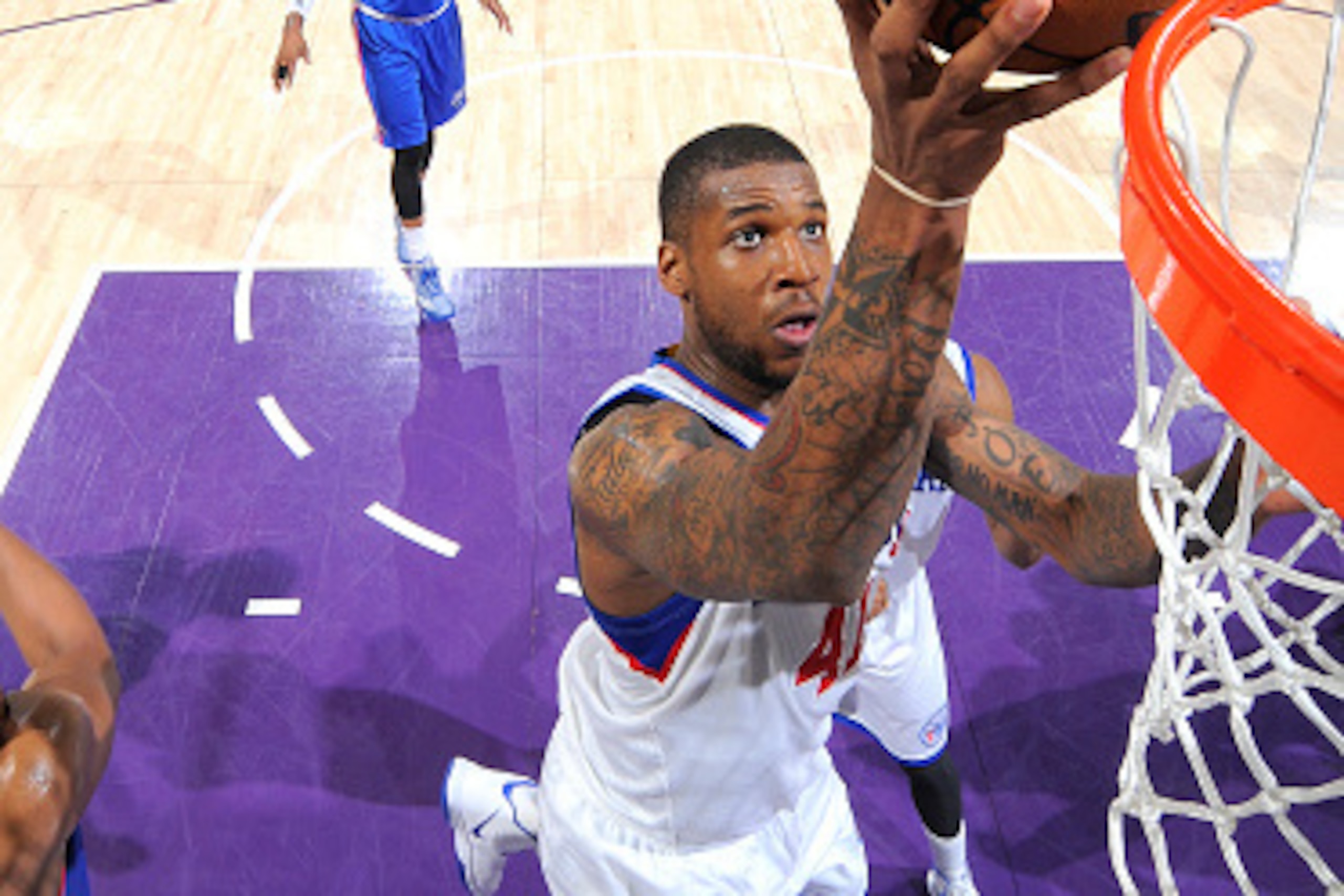 SACRAMENTO, CA - MARCH 24: Thomas Robinson #41 of the Philadelphia 76ers shoots a layup against the Sacramento Kings on March 24, 2015 at Sleep Train Arena in Sacramento, California. NOTE TO USER: User expressly acknowledges and agrees that, by downloadin