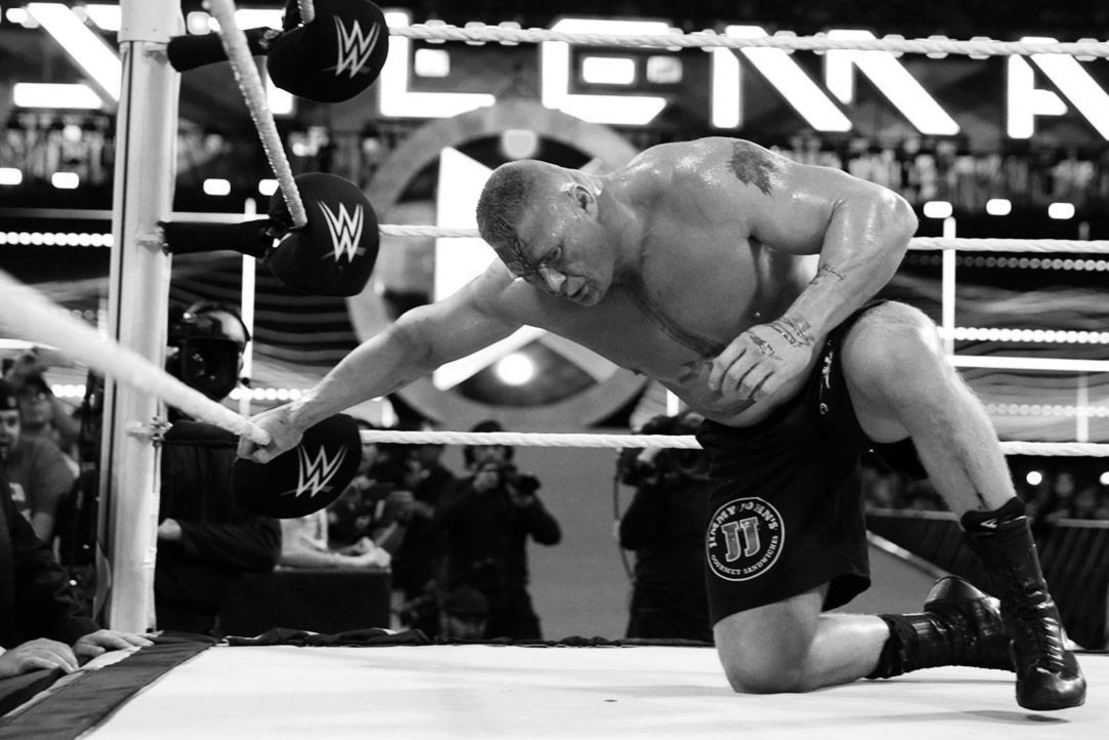 Brock Lesnar reeling from a Superman punch. Brock Lesnar reeling from a Superman punch.