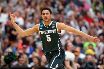SYRACUSE, NY - MARCH 29:  Bryn Forbes #5 of the Michigan State Spartans reacts to a three pointer in the second half of the game against the Louisville Cardinals during the East Regional Final of the 2015 NCAA Men's Basketball Tournament at Carrier Dome o