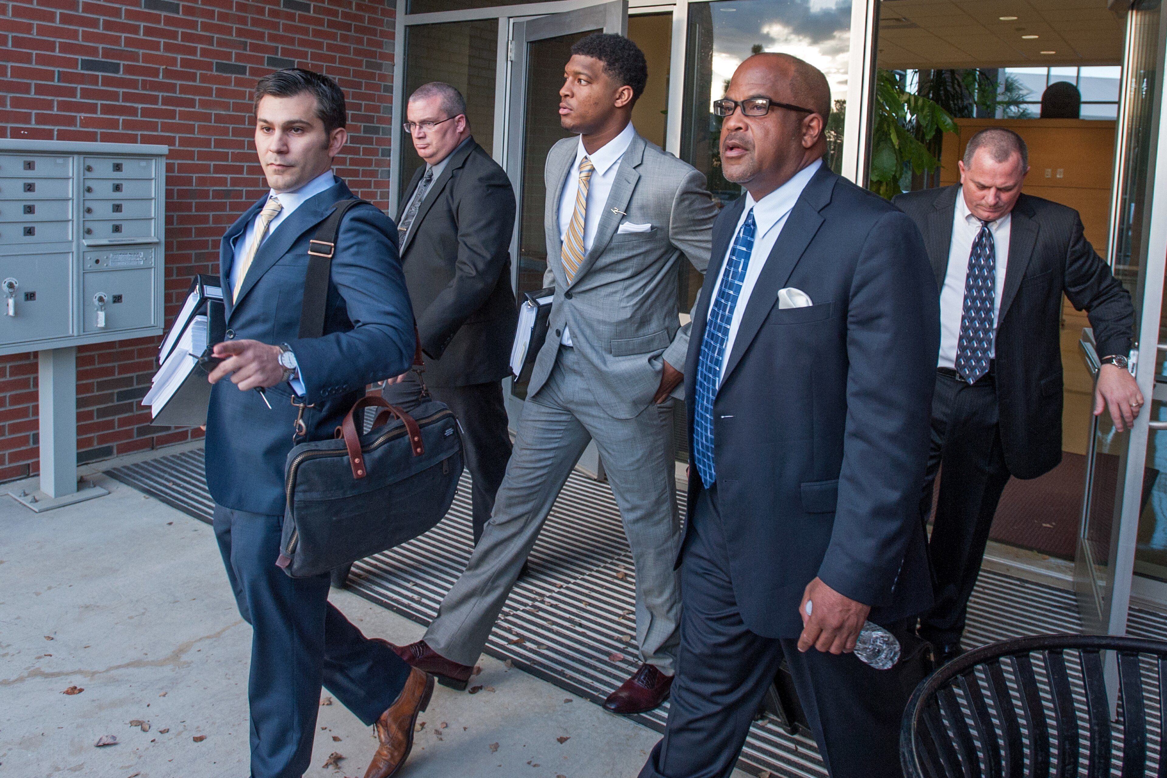 TALLAHASSEE, FL - DECEMBER 2: Florida State Seminoles quaterback Jameis Winston leaves his student conduct code hearing on December 2, 2014 in Tallahassee, Florida. The hearing will continue on Wednesday December 3rd. (Photo by Jeff Gammons/Getty Images) TALLAHASSEE, FL - DECEMBER 2: Florida State Seminoles quaterback Jameis Winston leaves his student conduct code hearing on December 2, 2014 in Tallahassee, Florida. The hearing will continue on Wednesday December 3rd. (Photo by Jeff Gammons/Getty Images)