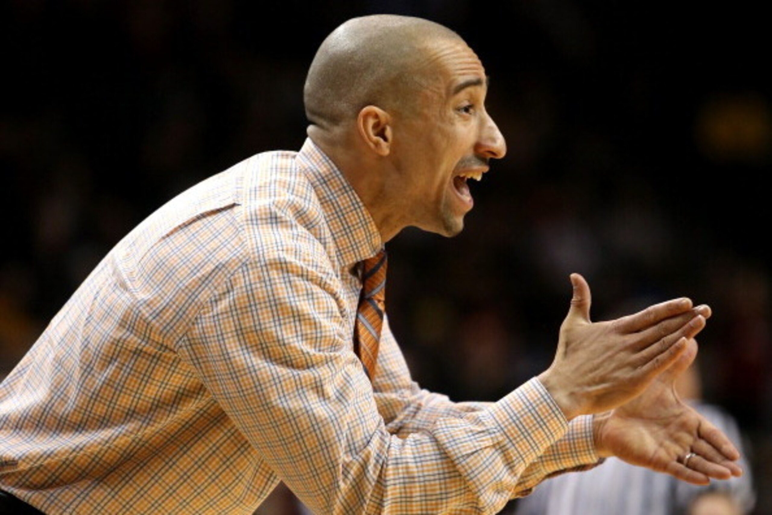 NEW YORK, NY - MARCH 16:  Head coach Shaka Smart of the Virginia Commonwealth Rams looks on from the bench in the first half against the Saint Joseph's Hawks during the Championship game of the 2014 Atlantic 10 Men's Basketball Tournament at Barclays Cent