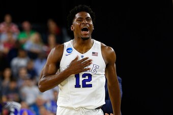 HOUSTON, TX - MARCH 27:  Justise Winslow #12 of the Duke Blue Devils reacts against the Utah Utes during a South Regional Semifinal game of the 2015 NCAA Men's Basketball Tournament at NRG Stadium on March 27, 2015 in Houston, Texas.  (Photo by Tom Pennin
