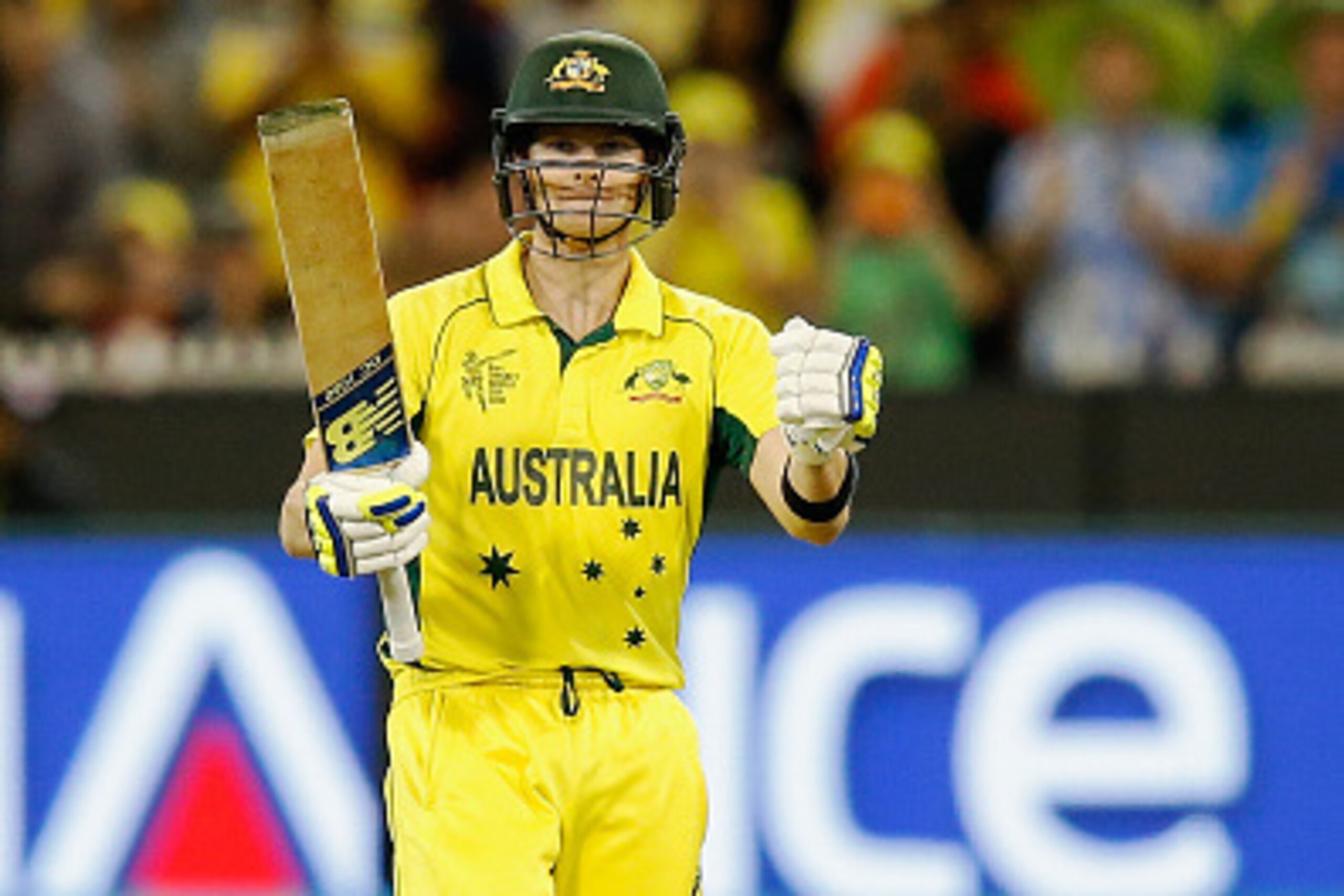 MELBOURNE, AUSTRALIA - MARCH 29:  Steve Smith of Australia raises his bat after scoring 50 runs during the 2015 ICC Cricket World Cup final match between Australia and New Zealand at Melbourne Cricket Ground on March 29, 2015 in Melbourne, Australia.  (Ph