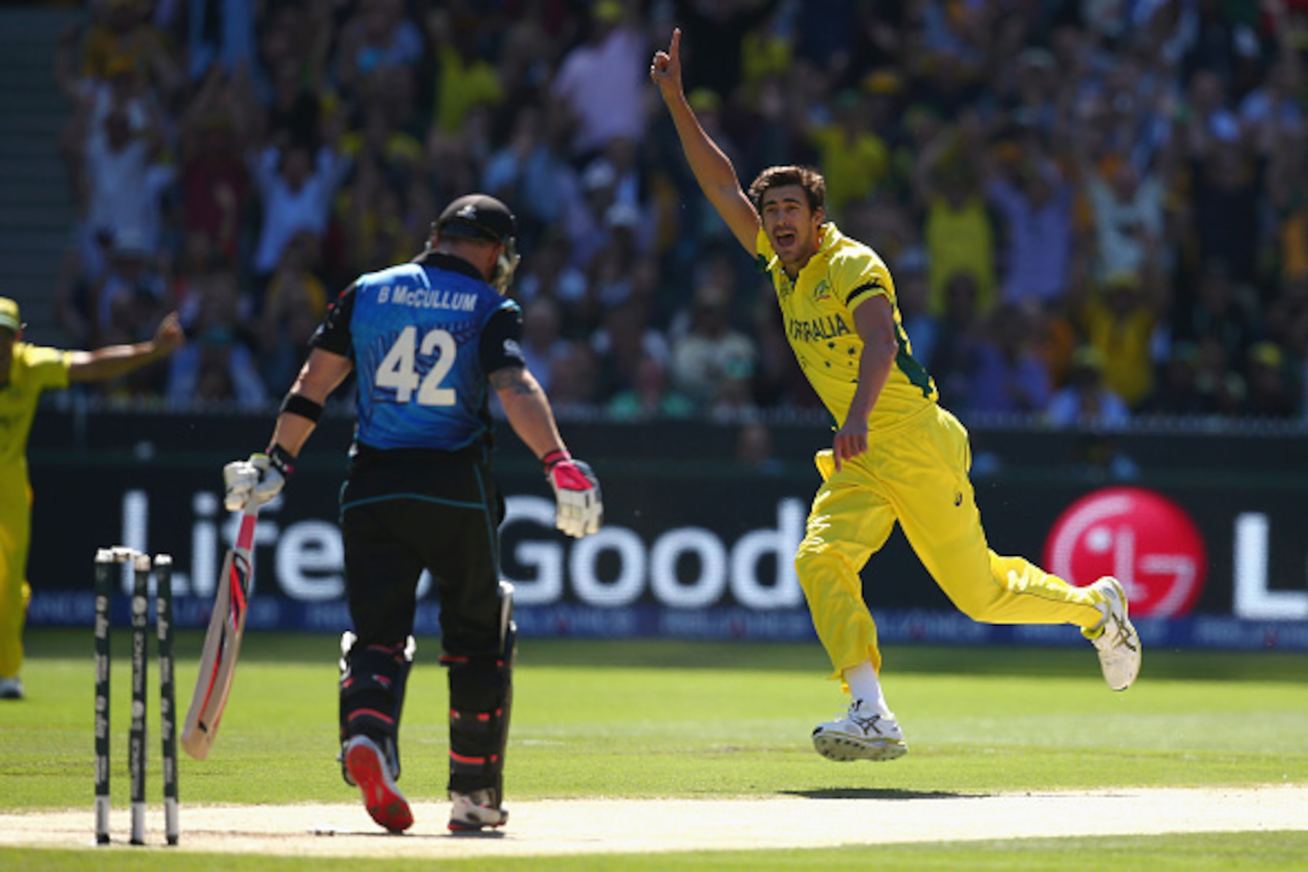 MELBOURNE, AUSTRALIA - MARCH 29:  Mitchell Starc of Australia celebrates taking the wicket of Brendon McCullum of New Zealand during the 2015 ICC Cricket World Cup final match between Australia and New Zealand at Melbourne Cricket Ground on March 29, 2015