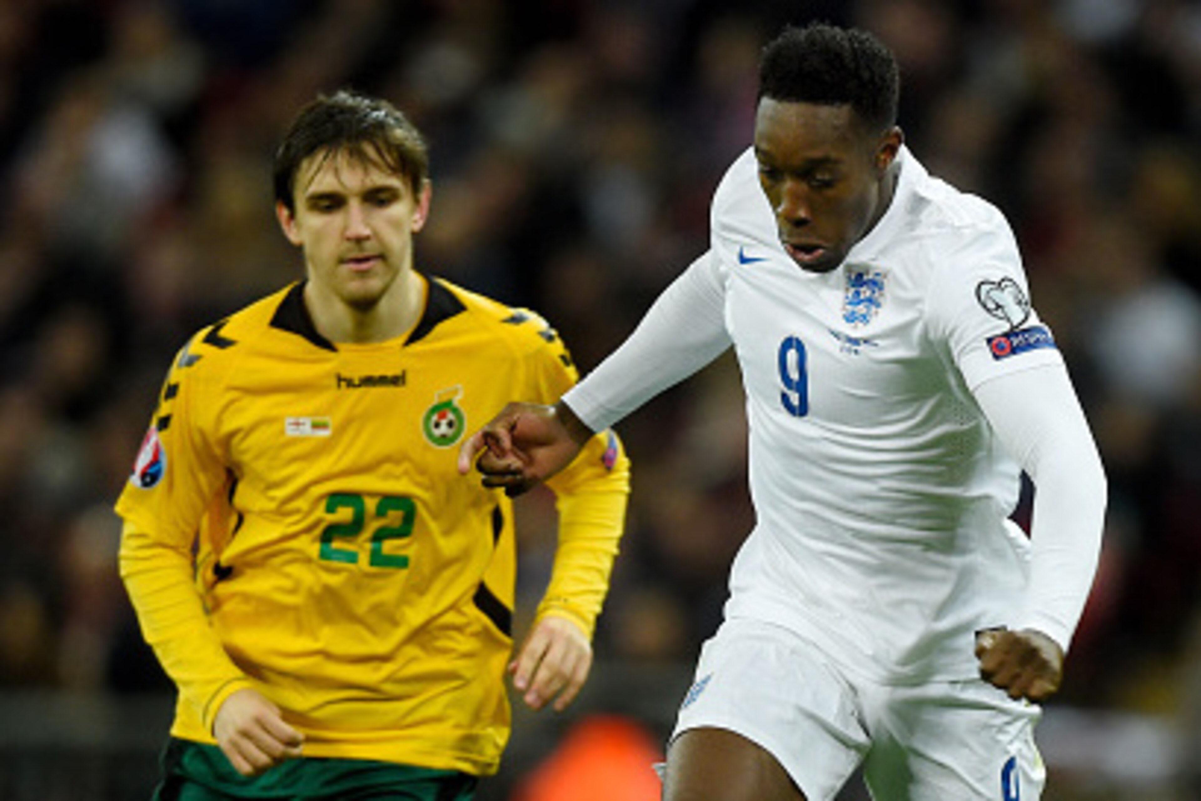 LONDON, ENGLAND - MARCH 27:  Danny Welbeck of England is pursued by Fiodor Cernych of Lithuania during the EURO 2016 Qualifier match between England and Lithuania at Wembley Stadium on March 27, 2015 in London, England.  (Photo by Mike Hewitt/Getty Images