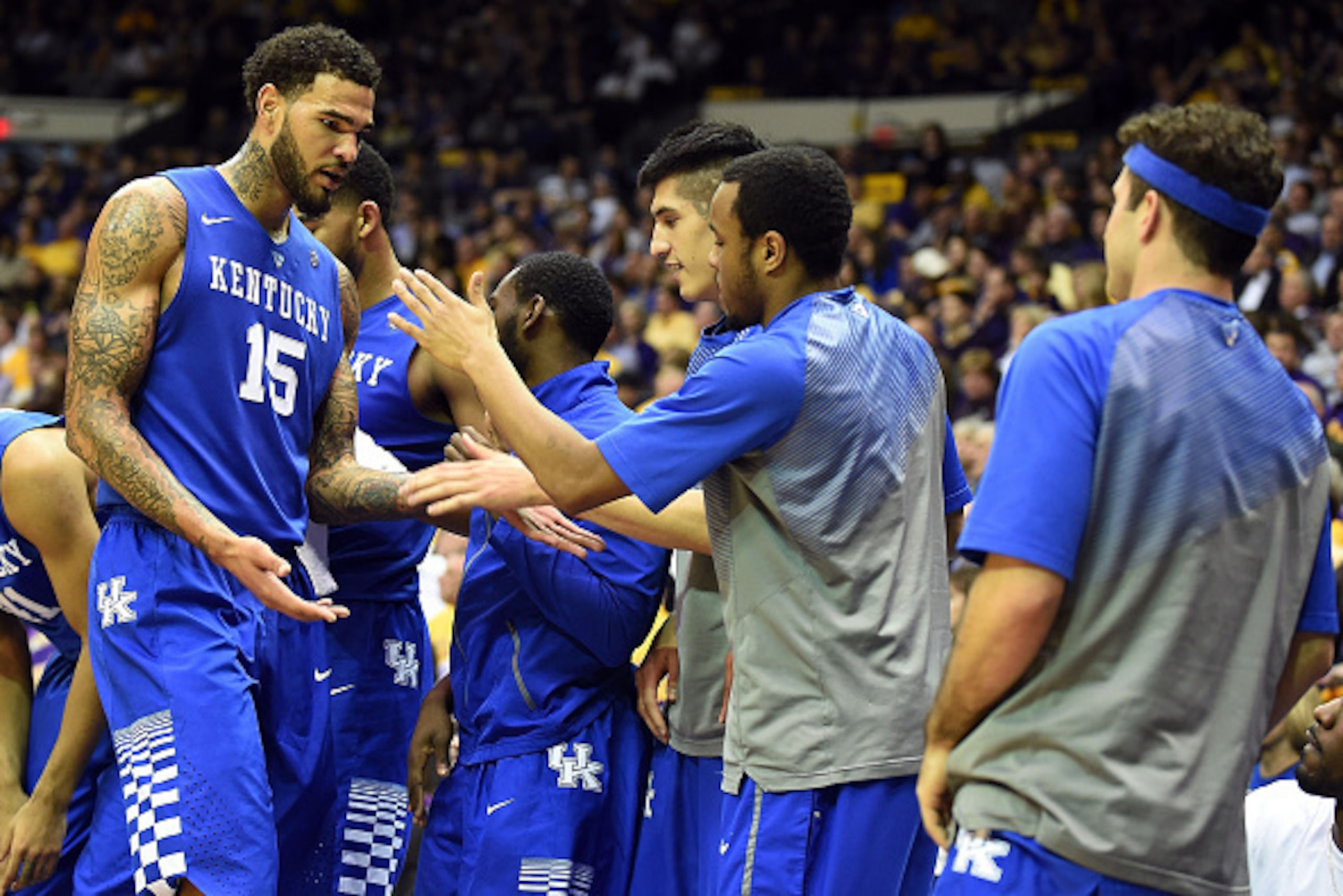 BATON ROUGE, LA - FEBRUARY 10:  Willie Cauley-Stein #15 of the Kentucky Wildcats is greeted by teammates as he comes out during the second half of a game against the LSU Tigers at the Pete Maravich Assembly Center on February 10, 2015 in Baton Rouge, Loui