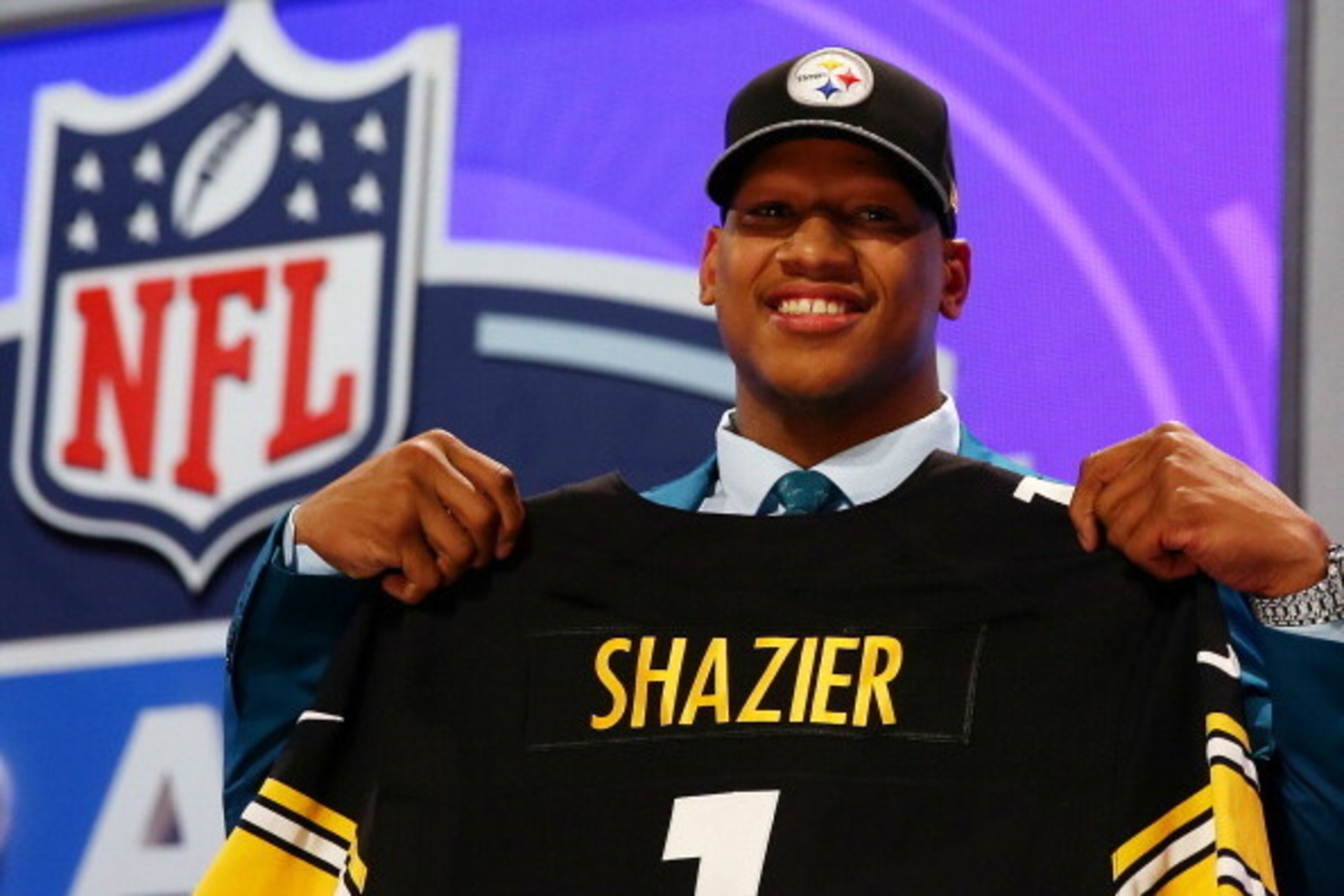 NEW YORK, NY - MAY 08: Ryan Shazier of the Ohio State Buckeyes poses with a jersey after he was picked #15 overall by the Pittsburgh Steelers during the first round of the 2014 NFL Draft at Radio City Music Hall on May 8, 2014 in New York City. (Photo b NEW YORK, NY - MAY 08: Ryan Shazier of the Ohio State Buckeyes poses with a jersey after he was picked #15 overall by the Pittsburgh Steelers during the first round of the 2014 NFL Draft at Radio City Music Hall on May 8, 2014 in New York City. (Photo b
