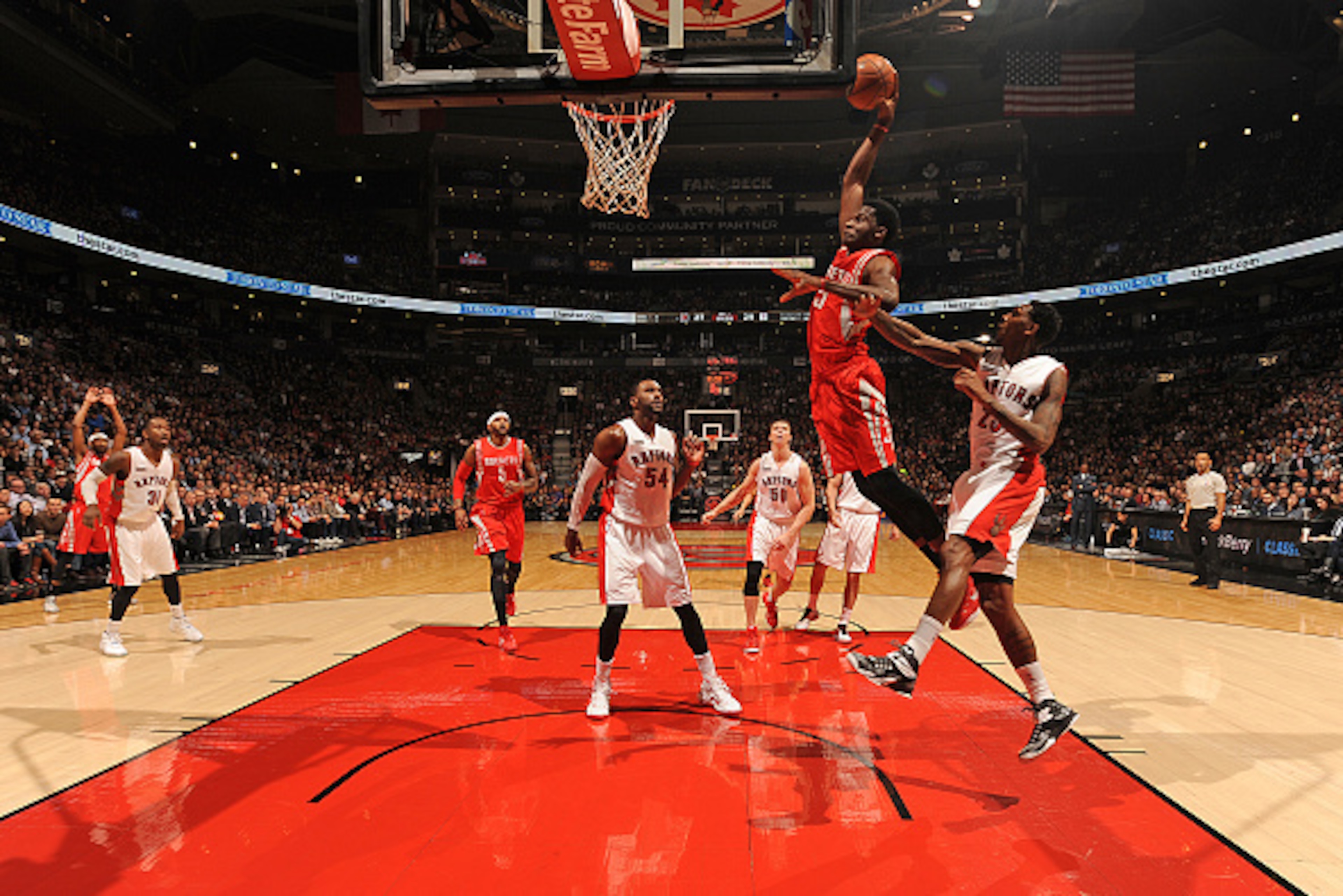 TORONTO, CANADA - MARCH 30:  Clint Capela #15 of the Houston Rockets goes up for a dunk against the Toronto Raptors on March, 30, 2015 at the Air Canada Centre in Toronto, Ontario, Canada.  NOTE TO USER: User expressly acknowledges and agrees that, by dow