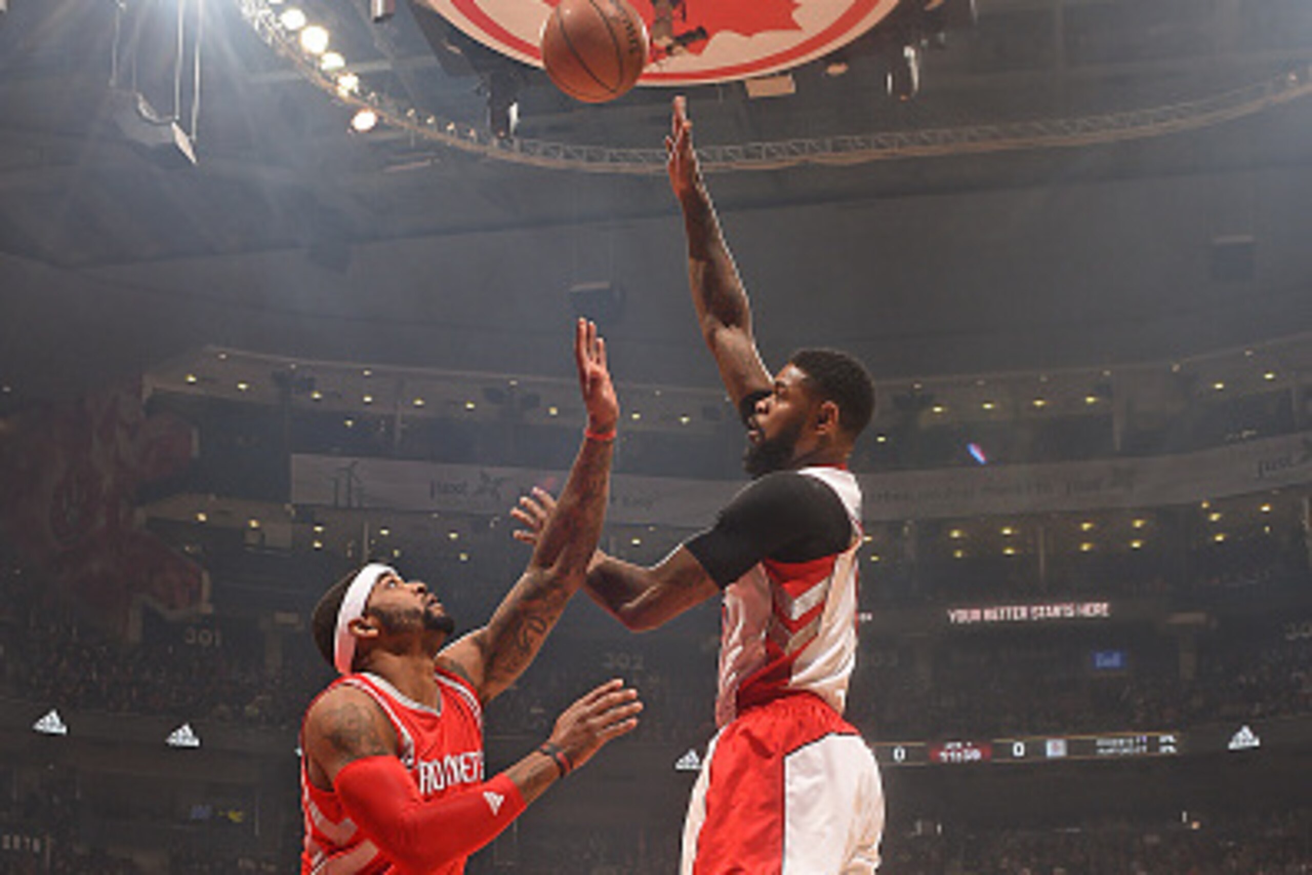TORONTO, CANADA - MARCH 30:  Amir Johnson #15 of the Toronto Raptors shoots the ball against the Houston Rockets on March, 30, 2015 at the Air Canada Centre in Toronto, Ontario, Canada.  NOTE TO USER: User expressly acknowledges and agrees that, by downlo