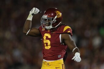 LOS ANGELES, CA - NOVEMBER 16:  Safety Josh Shaw #6 of the USC Trojans celebrates against the Stanford Cardinal at Los Angeles Coliseum on November 16, 2013 in Los Angeles, California.  (Photo by Jeff Gross/Getty Images)