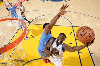 OAKLAND, CA - MARCH 8: Draymond Green #23 of the Golden State Warriors shoots against the Los Angeles Clippers on March 8, 2015 at Oracle Arena in Oakland, California. NOTE TO USER: User expressly acknowledges and agrees that, by downloading and or using 