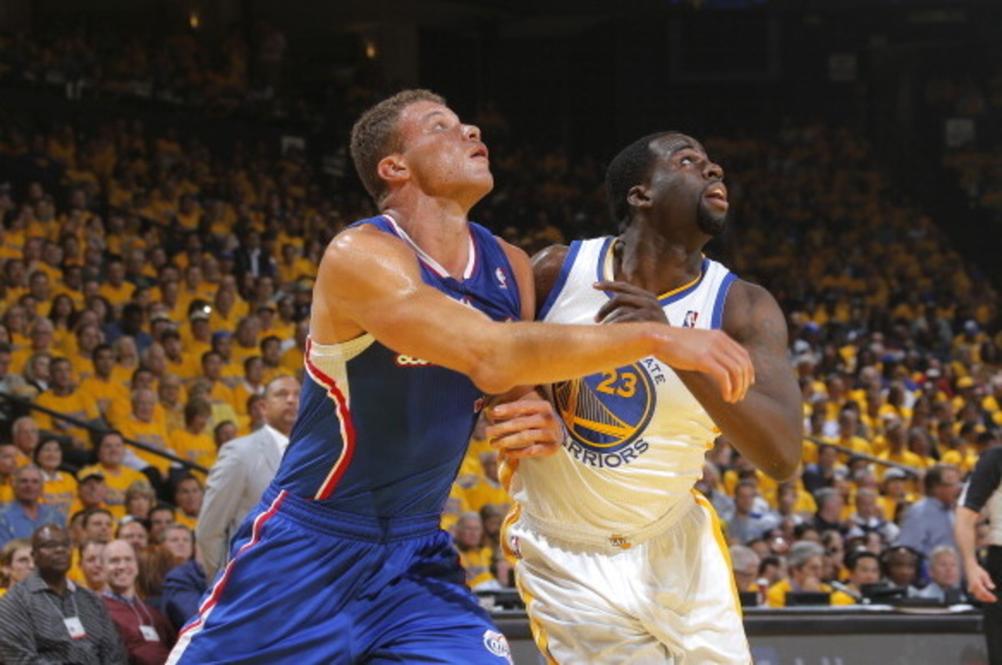 OAKLAND, CA - APRIL 24: Blake Griffin #32 of the Los Angeles Clippers and Draymond Green #23 of the Golden State Warriors fight for position in Game Three of the Western Conference Quarterfinals during the 2014 NBA Playoffs at Oracle Arena on April 24, 20