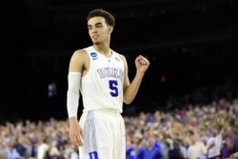 Mar 29, 2015; Houston, TX, USA; Duke Blue Devils guard Tyus Jones (5) pump his fist during the second half in the finals of the south regional of the 2015 NCAA Tournament against the Gonzaga Bulldogs at NRG Stadium. Mandatory Credit: Kevin Jairaj-USA TODA