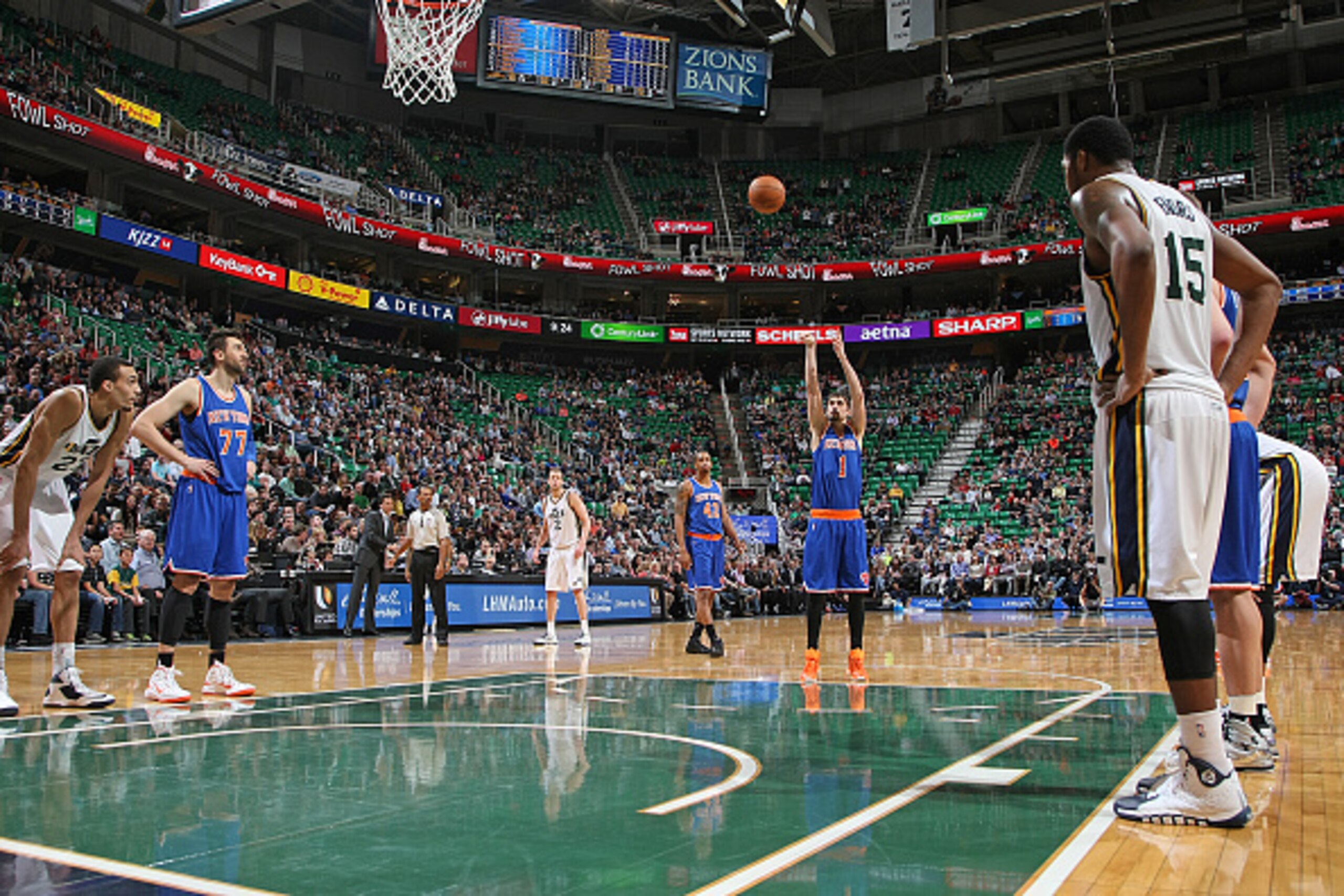 SALT LAKE CITY, UT - MARCH 10:  Alexey Shved #1 of the New York Knicks shoots a free throw against the Utah Jazz on March 10, 2015 at EnergySolutions Arena in Salt Lake City, Utah. NOTE TO USER: User expressly acknowledges and agrees that, by downloading 