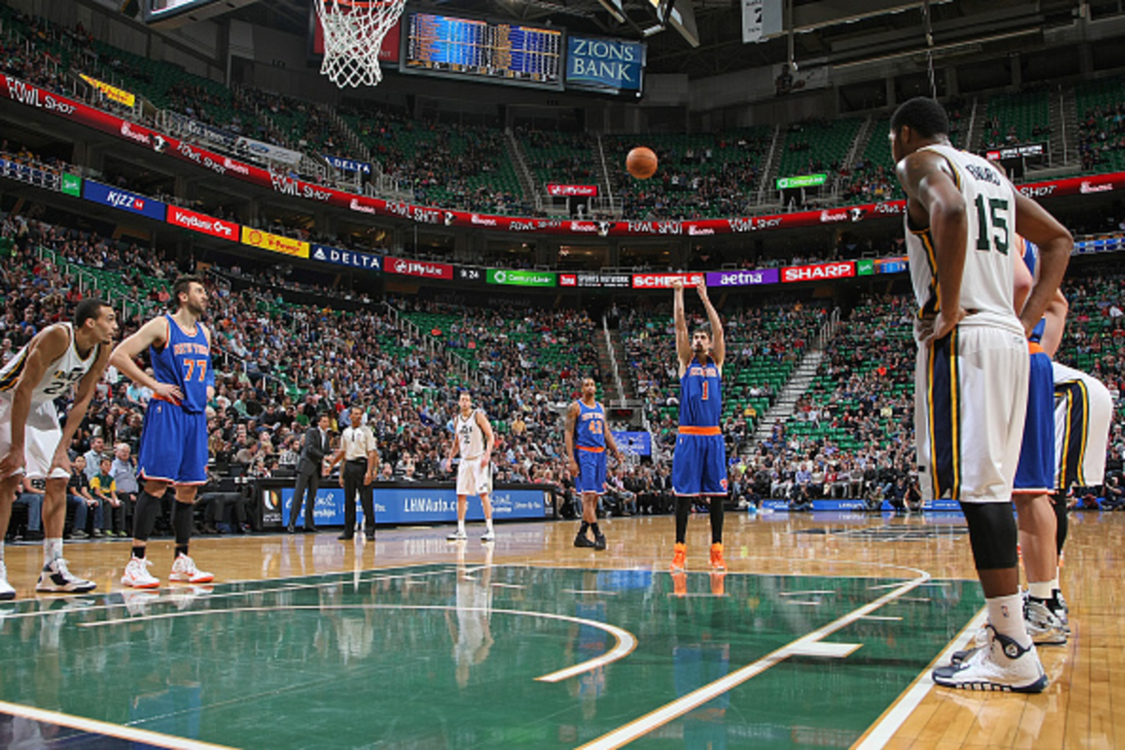 SALT LAKE CITY, UT - MARCH 10:  Alexey Shved #1 of the New York Knicks shoots a free throw against the Utah Jazz on March 10, 2015 at EnergySolutions Arena in Salt Lake City, Utah. NOTE TO USER: User expressly acknowledges and agrees that, by downloading 