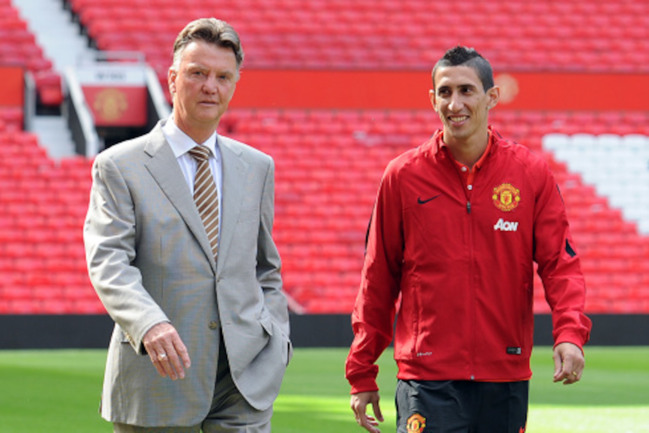 MANCHESTER, ENGLAND - AUGUST 28: Manchester United manager Louis Van Gaal with new signing Angel Di Maria at Old Trafford on August 28, 2014 in Manchester, England. (Photo by Chris Brunskill/Getty Images)