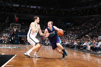 NEW YORK, NY - MARCH 4:  Cody Zeller #40 of the Charlotte Hornets drives to the basket after the game Bojan Bogdanovic #44 of the Brooklyn Nets on March 4, 2015 at the Barclays Center in the Brooklyn borough of New York City. NOTE TO USER: User expressly