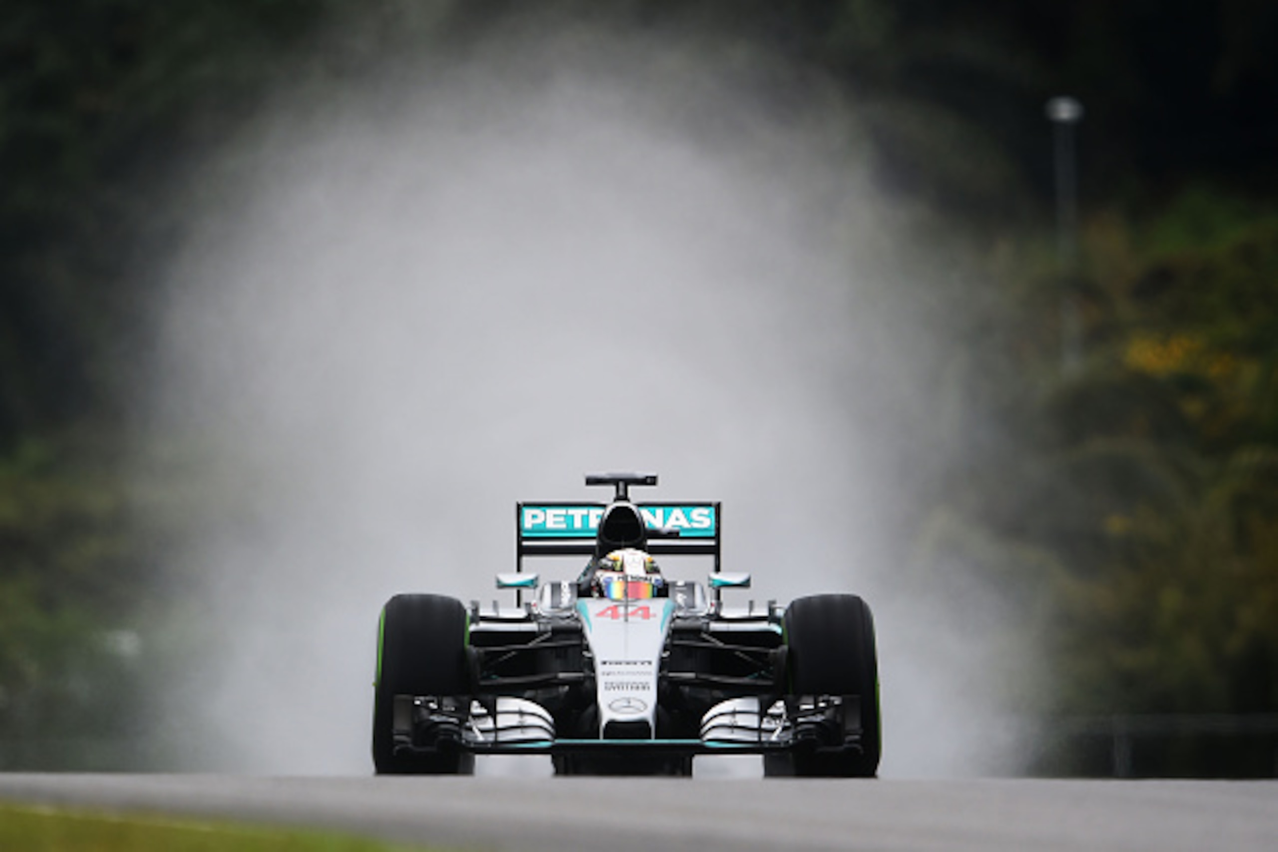 KUALA LUMPUR, MALAYSIA - MARCH 28:  Lewis Hamilton of Great Britain and Mercedes GP drives during final practice for the Malaysia Formula One Grand Prix at Sepang Circuit on March 28, 2015 in Kuala Lumpur, Malaysia.  (Photo by Lars Baron/Getty Images)