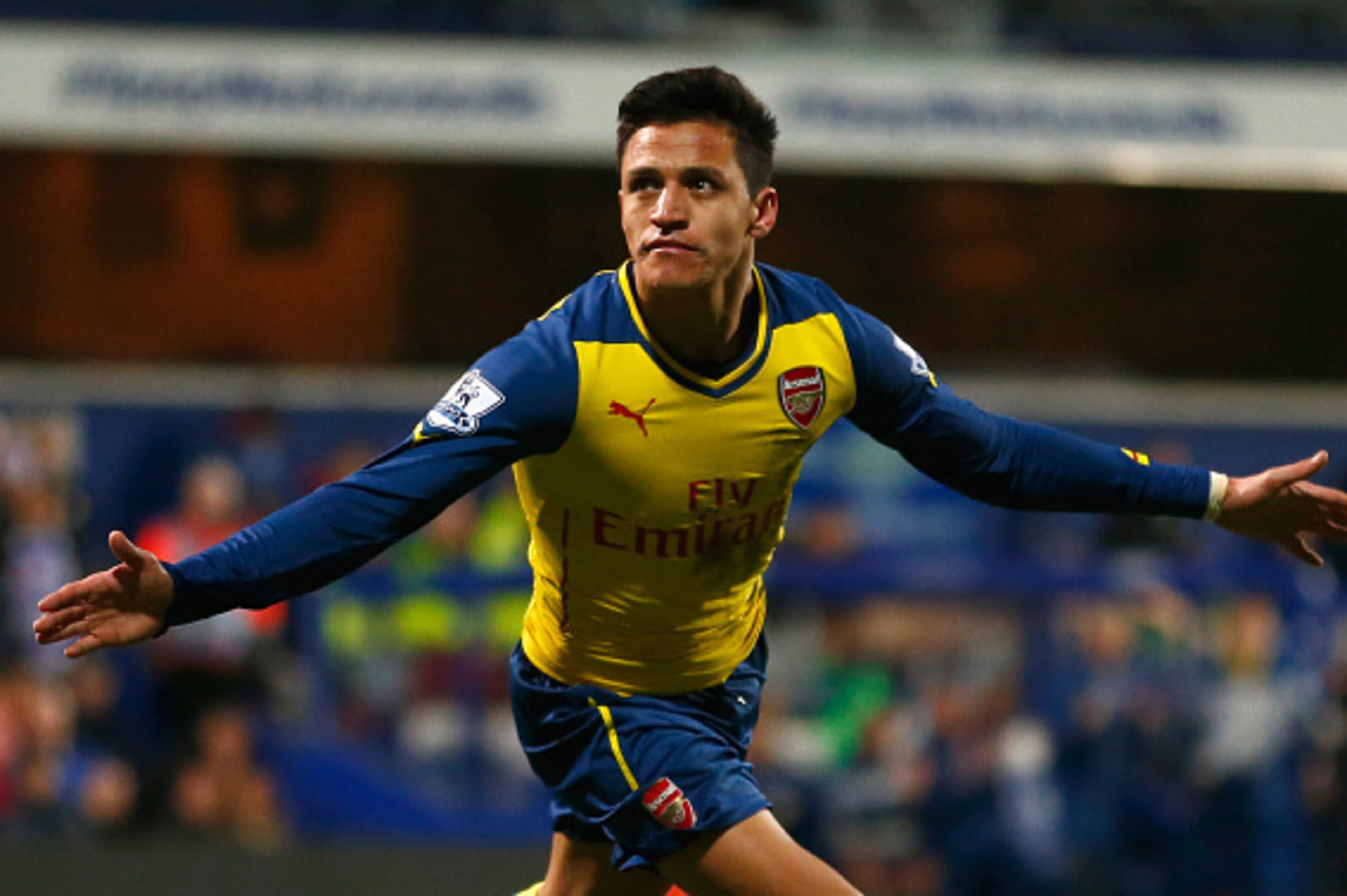 LONDON, ENGLAND - MARCH 04: Alexis Sanchez of Arsenal celebrates as he scores their second goal during the Barclays Premier League match between Queens Park Rangers and Arsenal at Loftus Road on March 4, 2015 in London, England. (Photo by Julian Finney/ LONDON, ENGLAND - MARCH 04: Alexis Sanchez of Arsenal celebrates as he scores their second goal during the Barclays Premier League match between Queens Park Rangers and Arsenal at Loftus Road on March 4, 2015 in London, England. (Photo by Julian Finney/