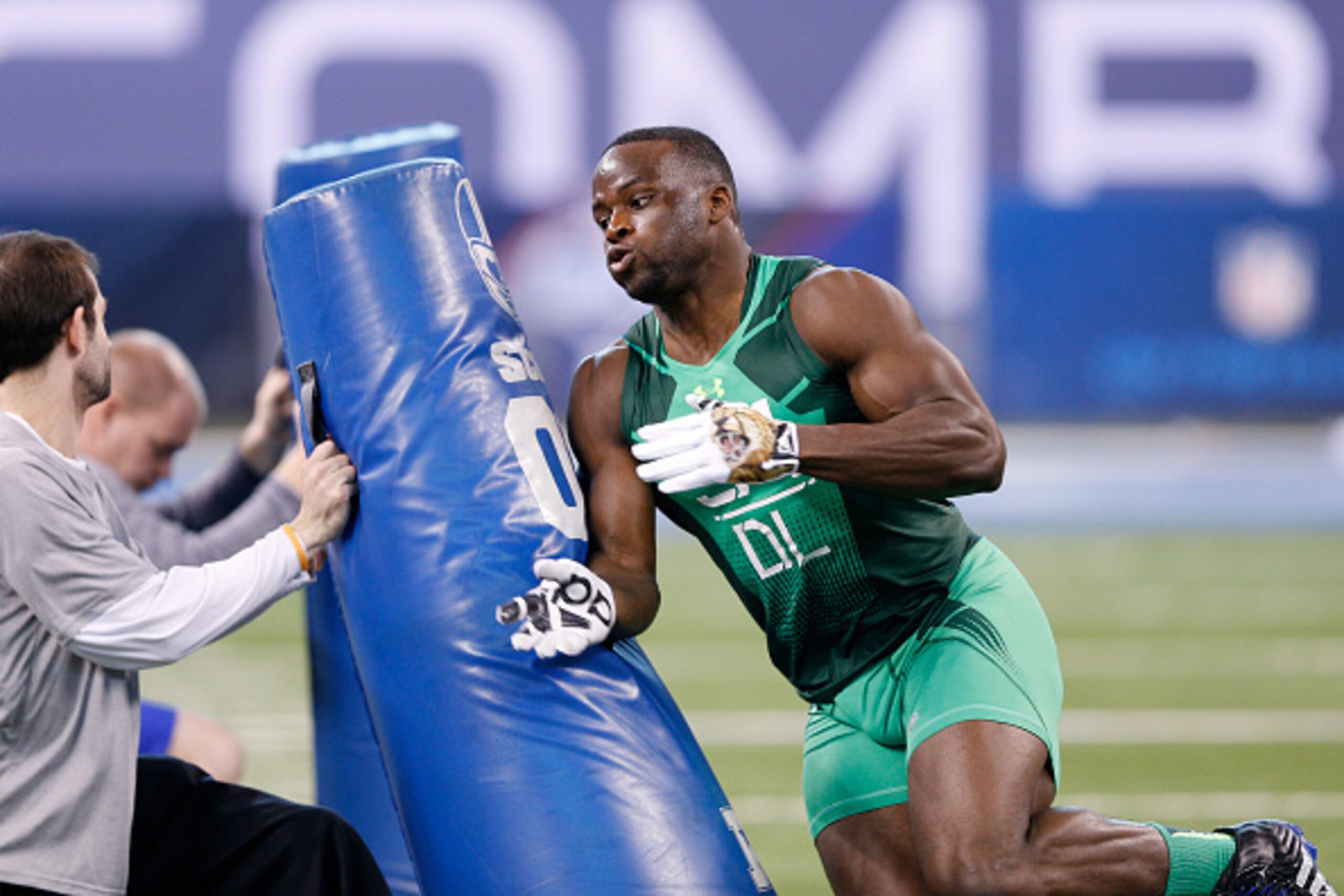 INDIANAPOLIS, IN - FEBRUARY 22: Defensive lineman Owamagbe Odighizuwa of UCLA competes during the 2015 NFL Scouting Combine at Lucas Oil Stadium on February 22, 2015 in Indianapolis, Indiana. (Photo by Joe Robbins/Getty Images)