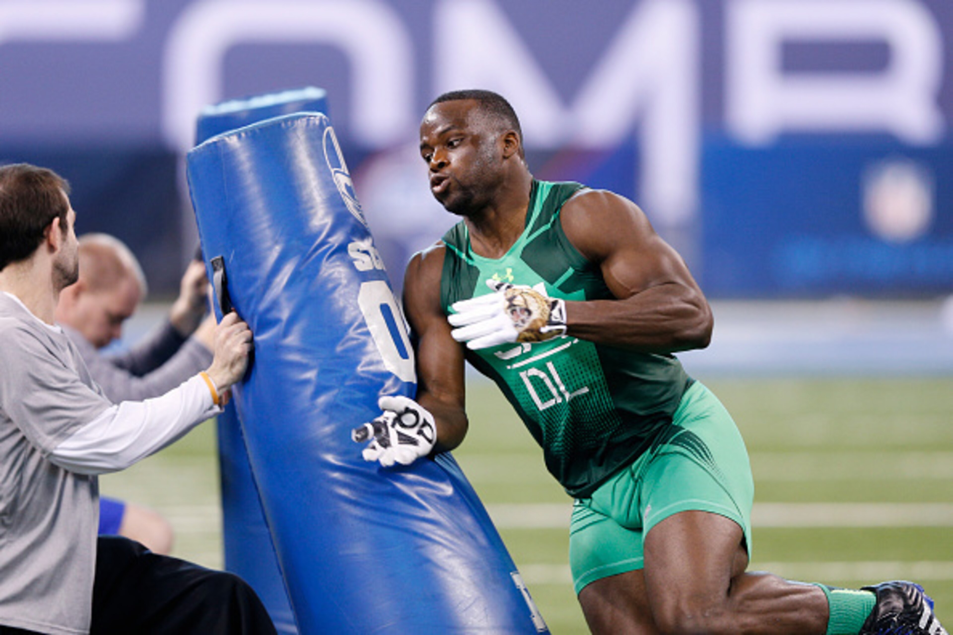 INDIANAPOLIS, IN - FEBRUARY 22: Defensive lineman Owamagbe Odighizuwa of UCLA competes during the 2015 NFL Scouting Combine at Lucas Oil Stadium on February 22, 2015 in Indianapolis, Indiana. (Photo by Joe Robbins/Getty Images)