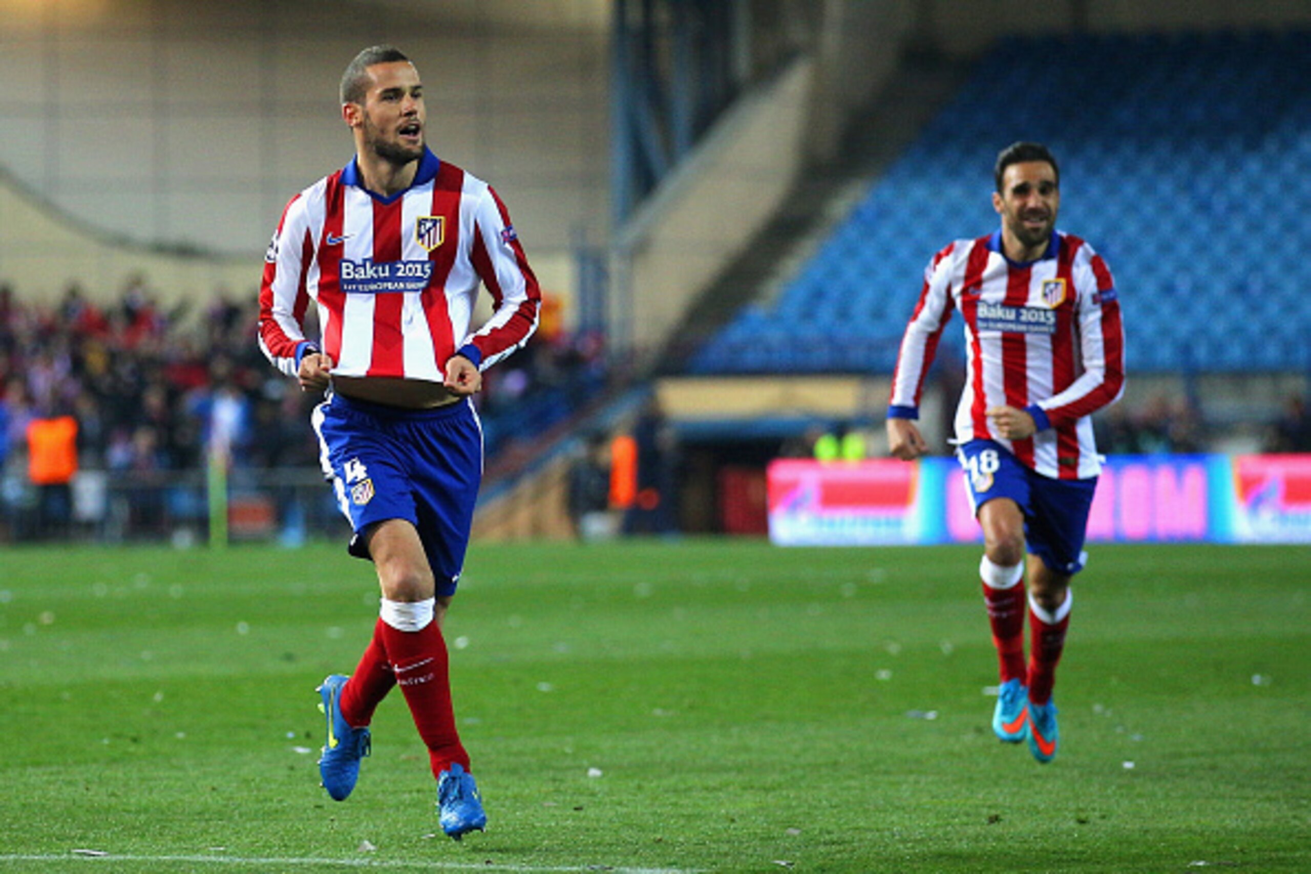 MADRID, SPAIN - MARCH 17:  Mario Suarez of Atletico Madrid celebrates scoring the opening goal during the UEFA Champions League round of 16 match between Club Atletico de Madrid and Bayer 04 Leverkusen at Vicente Calderon Stadium on March 17, 2015 in Madr