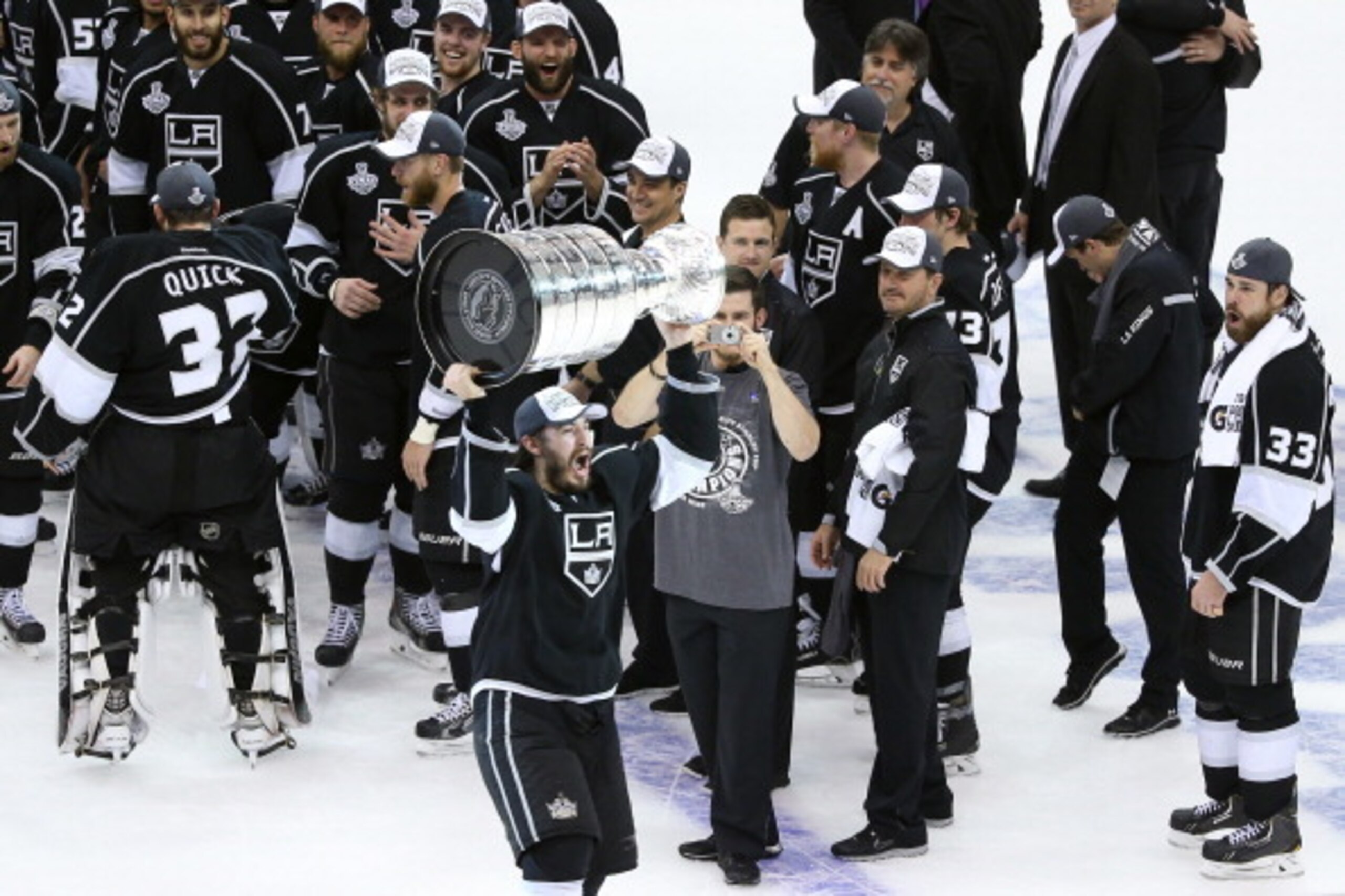 LOS ANGELES, CA - JUNE 13:  Drew Doughty #8 of the Los Angeles Kings celebrates with the Stanley Cup after the Kings 3-2 double overtime victory against the New York Rangers in Game Five of the 2014 Stanley Cup Final at Staples Center on June 13, 2014 in 
