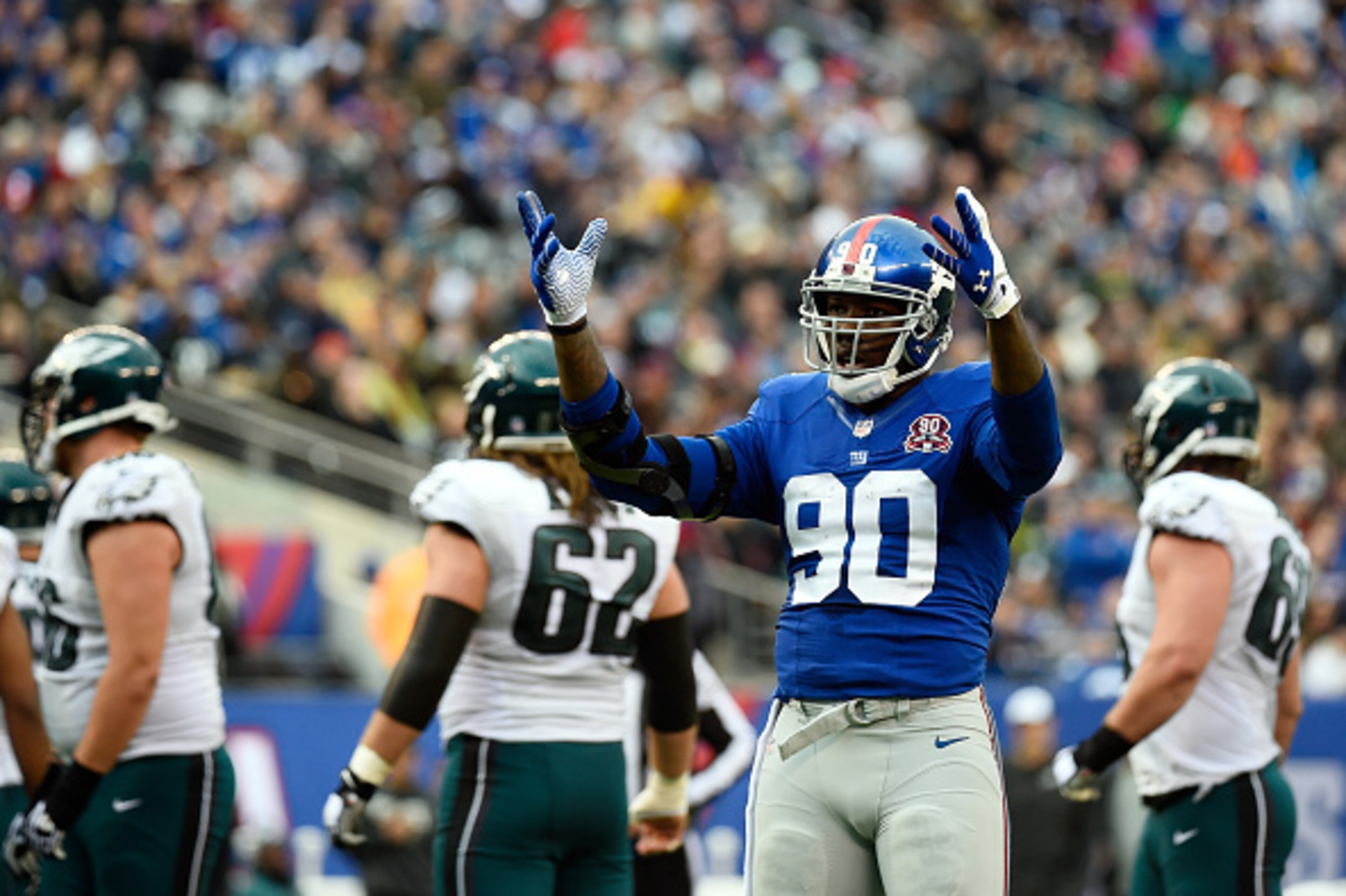 EAST RUTHERFORD, NJ - DECEMBER 28: Jason Pierre-Paul #90 of the New York Giants reacts against the Philadelphia Eagles during a game at MetLife Stadium on December 28, 2014 in East Rutherford, New Jersey. (Photo by Alex Goodlett/Getty Images) EAST RUTHERFORD, NJ - DECEMBER 28: Jason Pierre-Paul #90 of the New York Giants reacts against the Philadelphia Eagles during a game at MetLife Stadium on December 28, 2014 in East Rutherford, New Jersey. (Photo by Alex Goodlett/Getty Images)