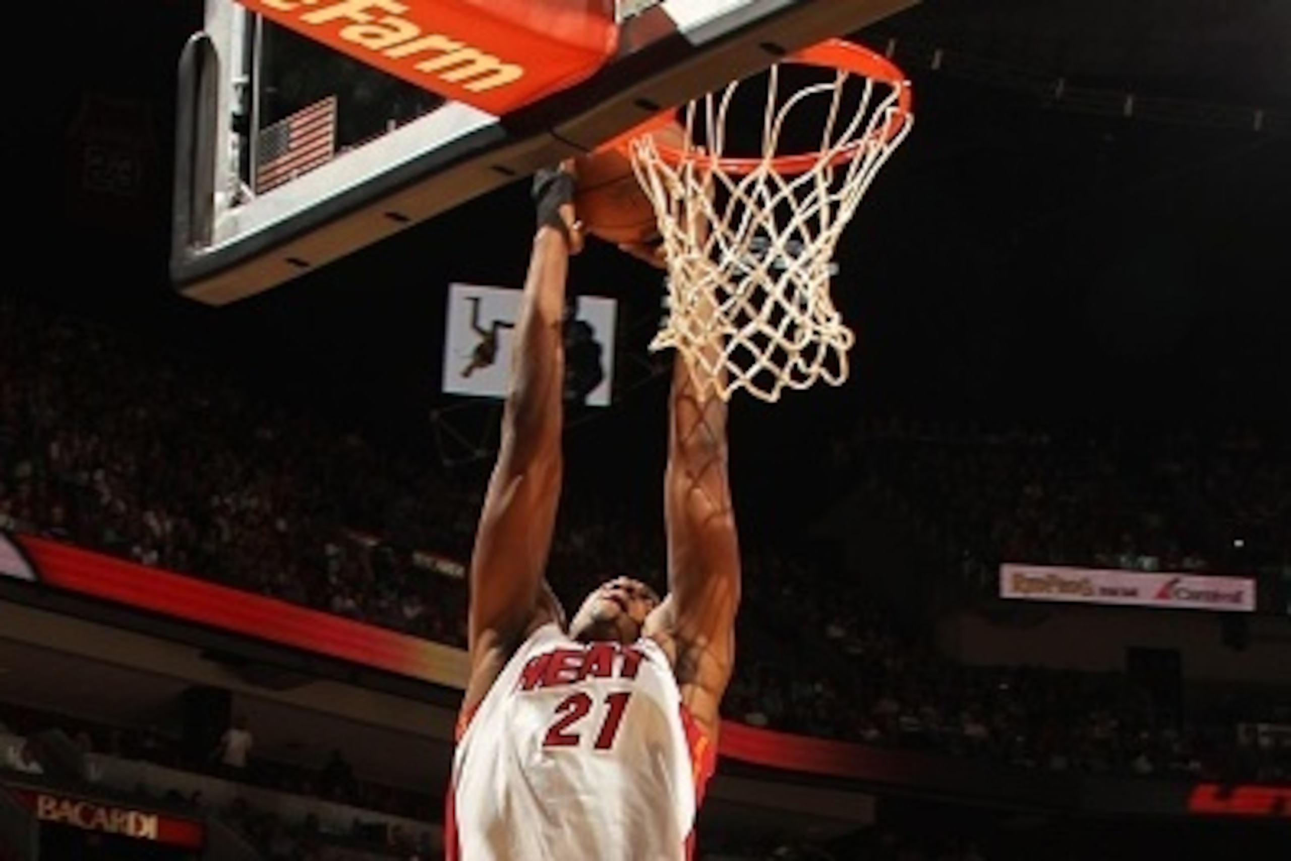 MIAMI, FL - MARCH 31:  Hassan Whiteside #21 of the Miami Heat goes up for a shot against the San Antonio Spurs on March 31, 2015 at American Airlines Arena in Miami, Florida.  NOTE TO USER: User expressly acknowledges and agrees that, by downloading and o